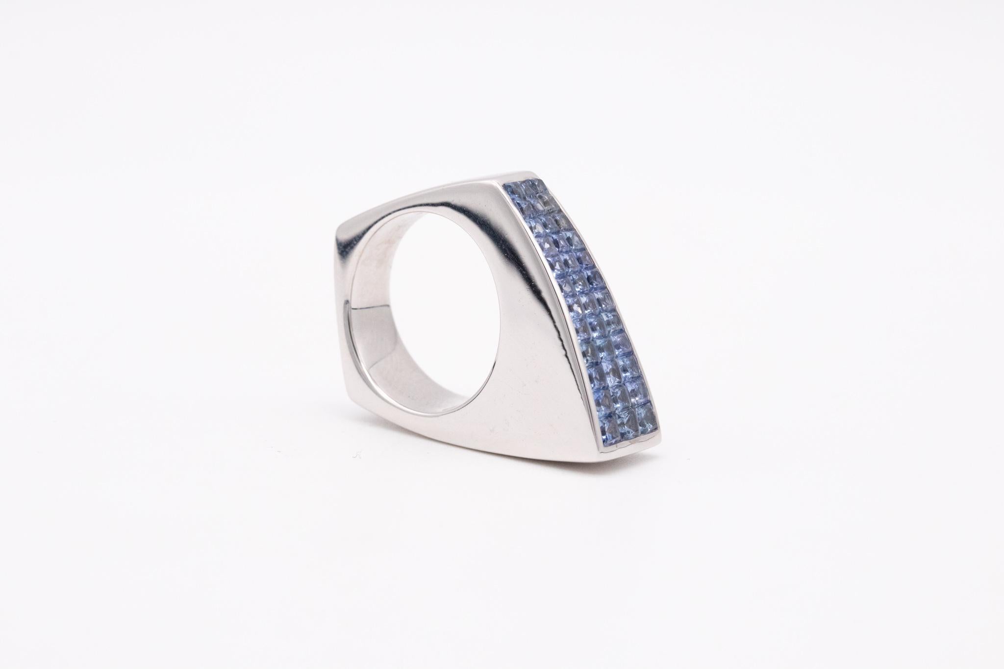 Geometric Ring in 18kt Gold Invisible Setting of 2.52 Ctw Ceylon Blue Sapphires For Sale 4