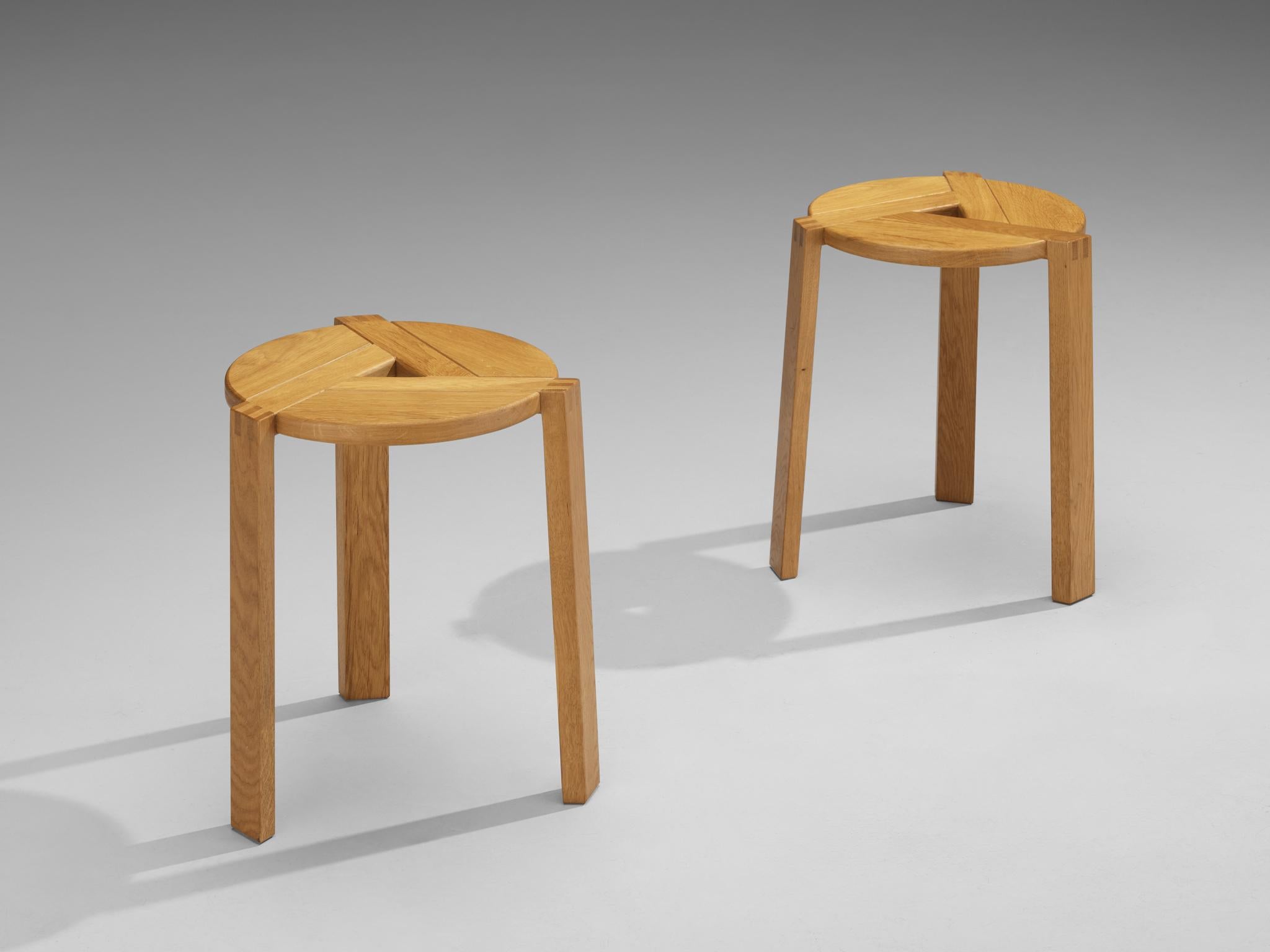 Stools, solid oak, Germany, 1990s

Striking geometric stool or side table made from solid oakwood. The wood-joints specialize the design and highlight the admirable craftsmanship. The blonde tone and the beautiful grains impart the piece with a