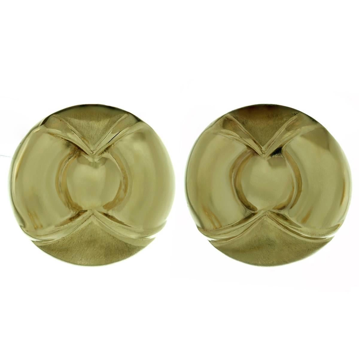 Geometrische runde Gelbgold-Ohrringe mit Knopfleiste