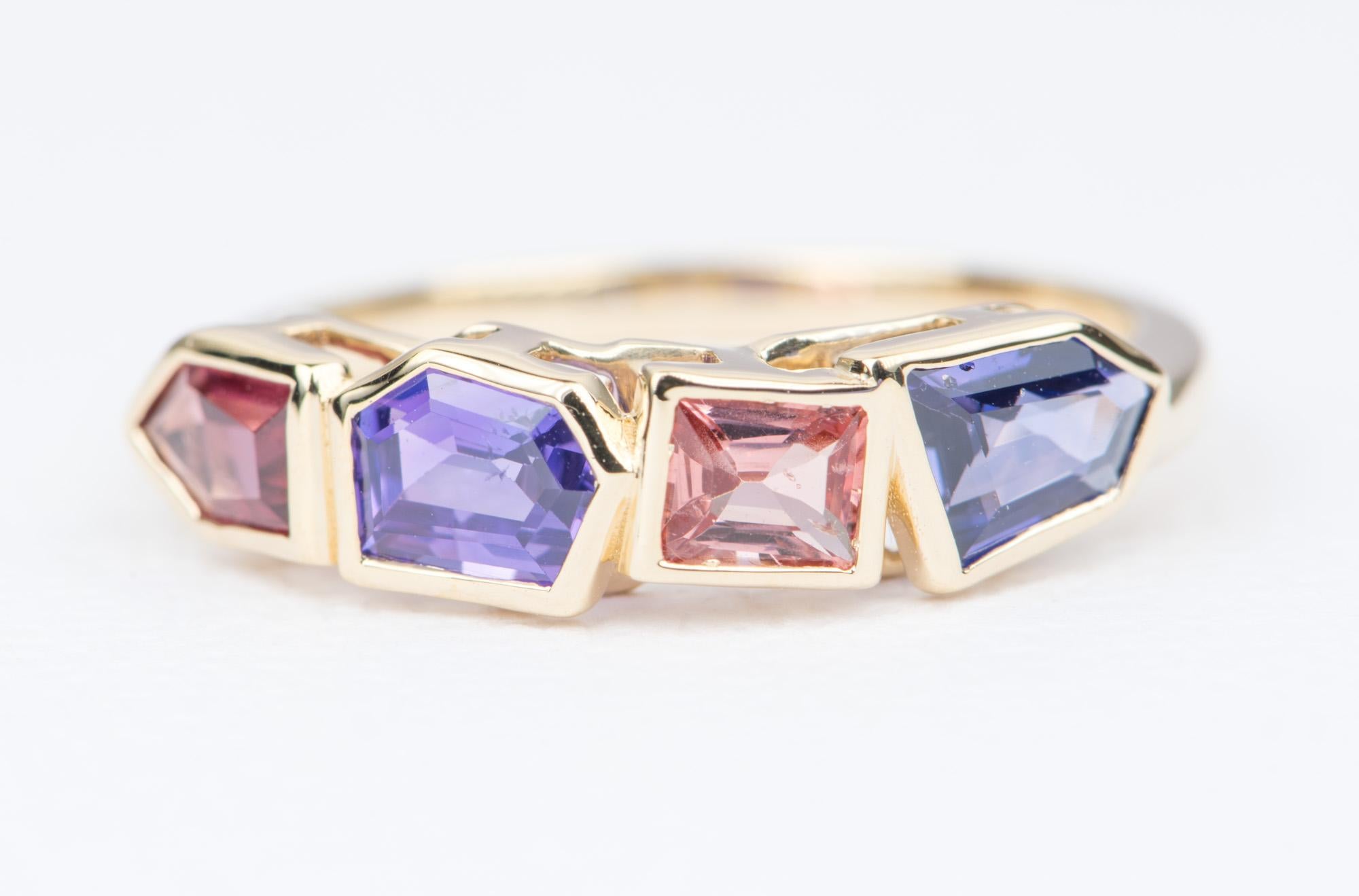 ♥  A solid 14k yellow gold geometric shaped alternating sapphire and spinel bezel set into a unique wedding band
♥  The overall setting measures 20.25mm in width, 5.10mm in length, and sits 3.79mm tall from the finger

♥  Band width: 1.82mm
♥ 
