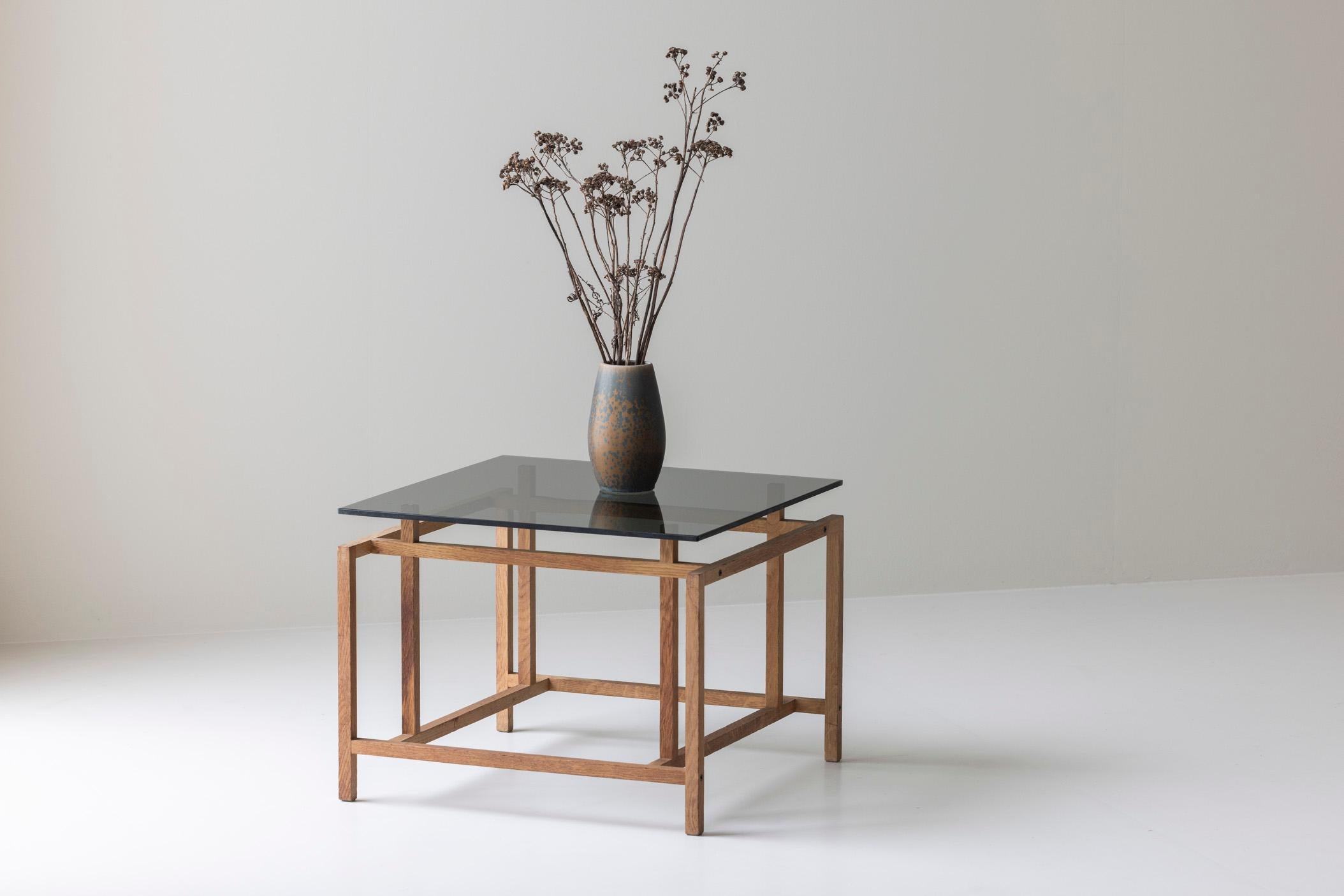 Add a touch of Danish elegance and modernist charm to your home with this geometric side table by Henning Nørgaard for Komfort Møbler, crafted in the 1970s. Known for his clean lines and functional designs, Nørgaard’s work seamlessly blends