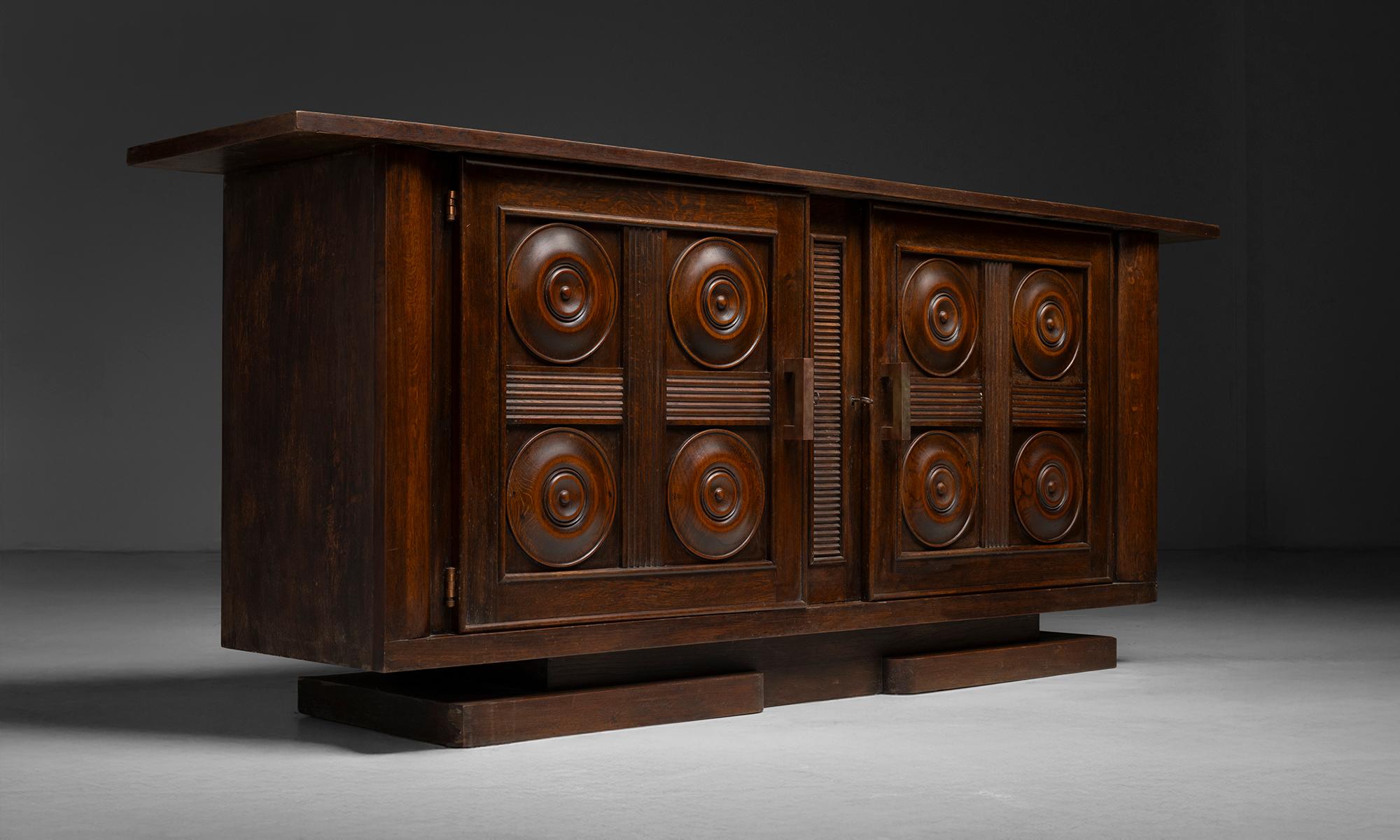 France, 1940
Carved decorative sideboard with paneled surface featuring alternate wood grains to create a checkerboard effect.
95”L x 21.75”d x 39.25”h
Ref. CFRN1367
$ 9,200