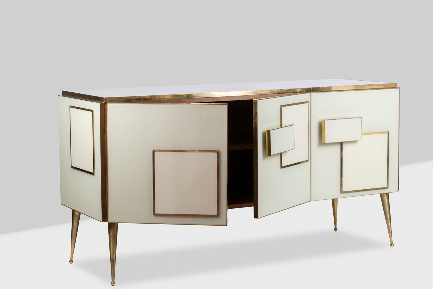 Brass Geometric sideboard in glass and gilded brass. Contemporary Italian work. For Sale