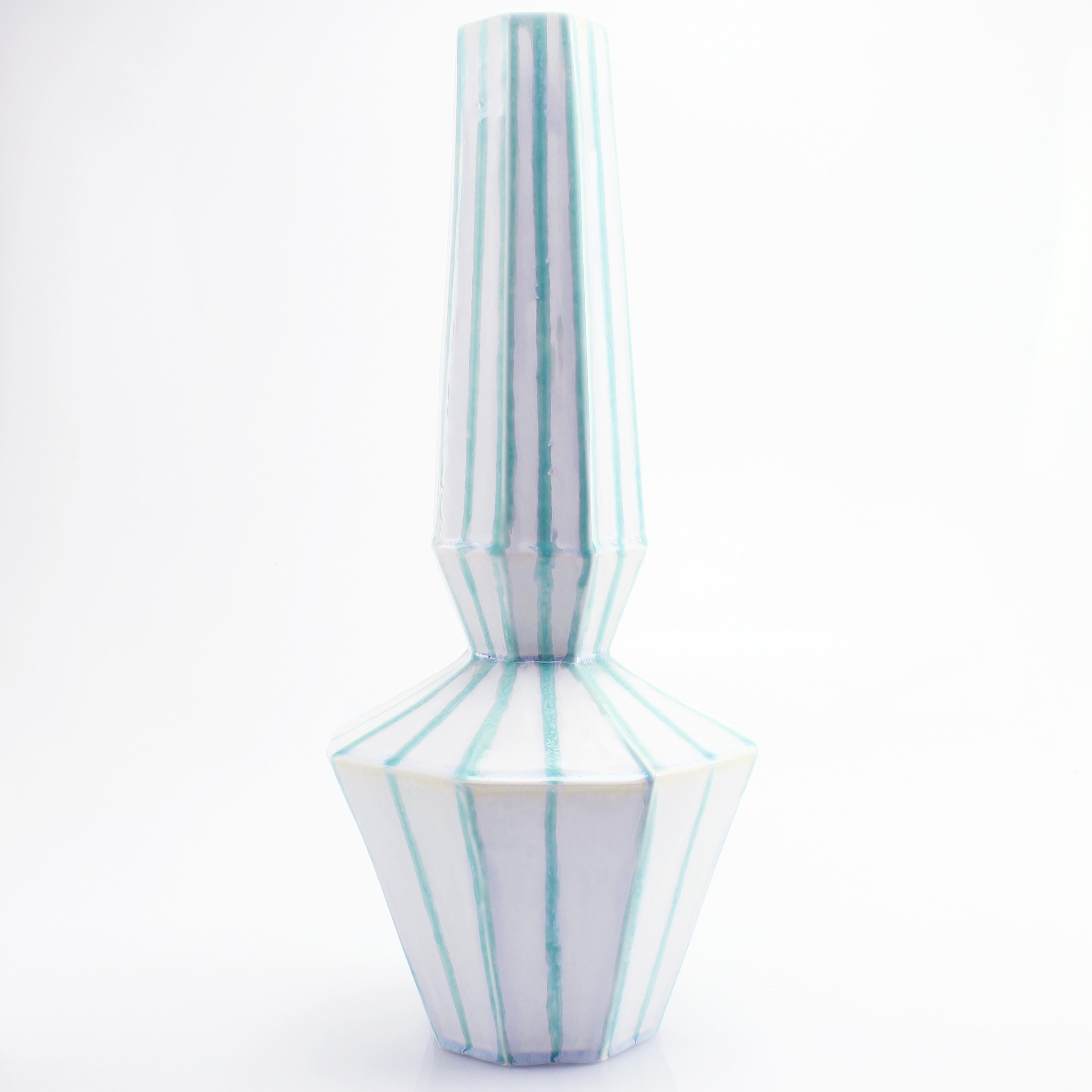 white faceted vase