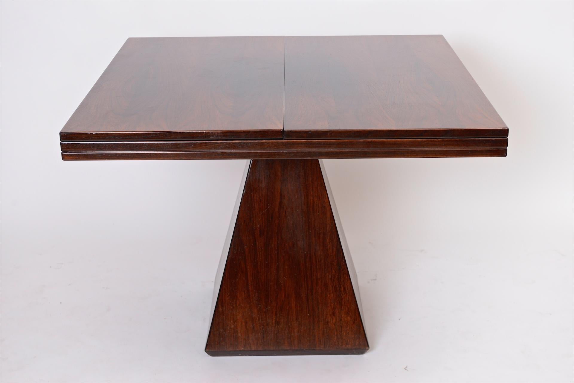 Rosewood extending table

Dimensions closed 100 cm x 100 cm x 75 cm (H)

Open 200 cm length.