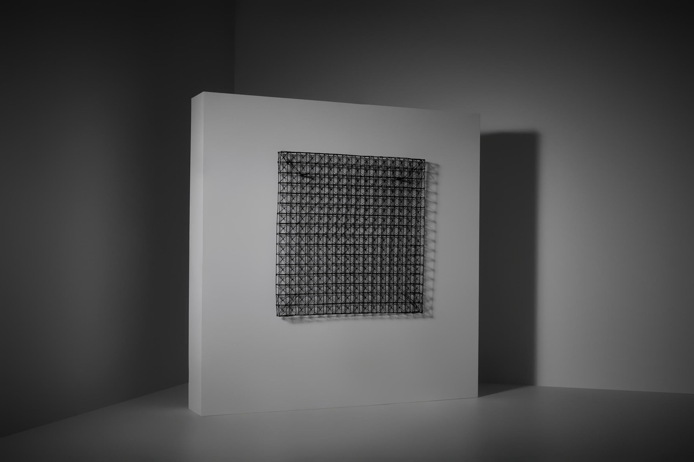 Geometric three-dimensional metal wall mounted sculpture, France 1960s. The sculpture shows open modular cubes and primary shapes creating a hierarchical structure and an interesting dialogue between the positive and negative space. The relief,