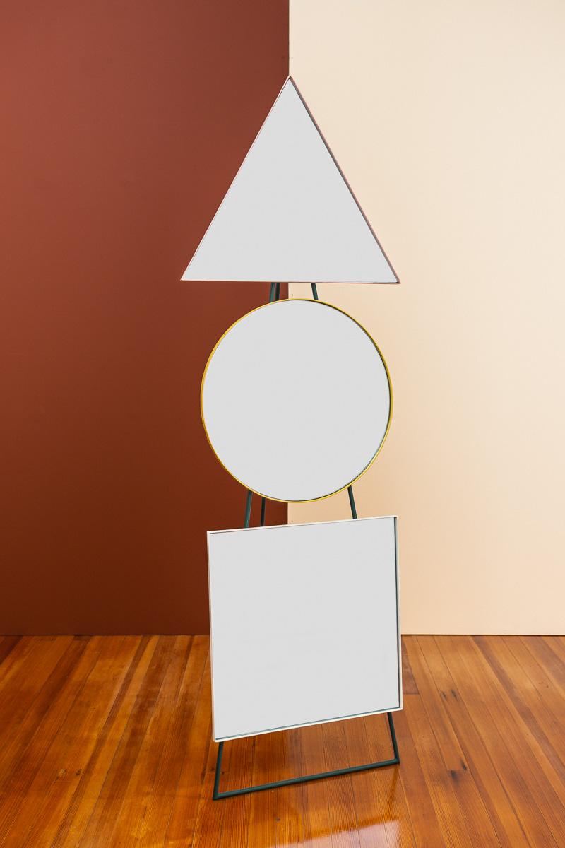 Geometric trilogy by Sofia Alvarado
Limited edition 1of 3 (one in stock)
Materials: Metal, mirror glass
Dimensions: H 175 x W 60 x D 50 cm

FI is an ornamental artist who embodies the creative Revelation of the sensitivity of the 
innate