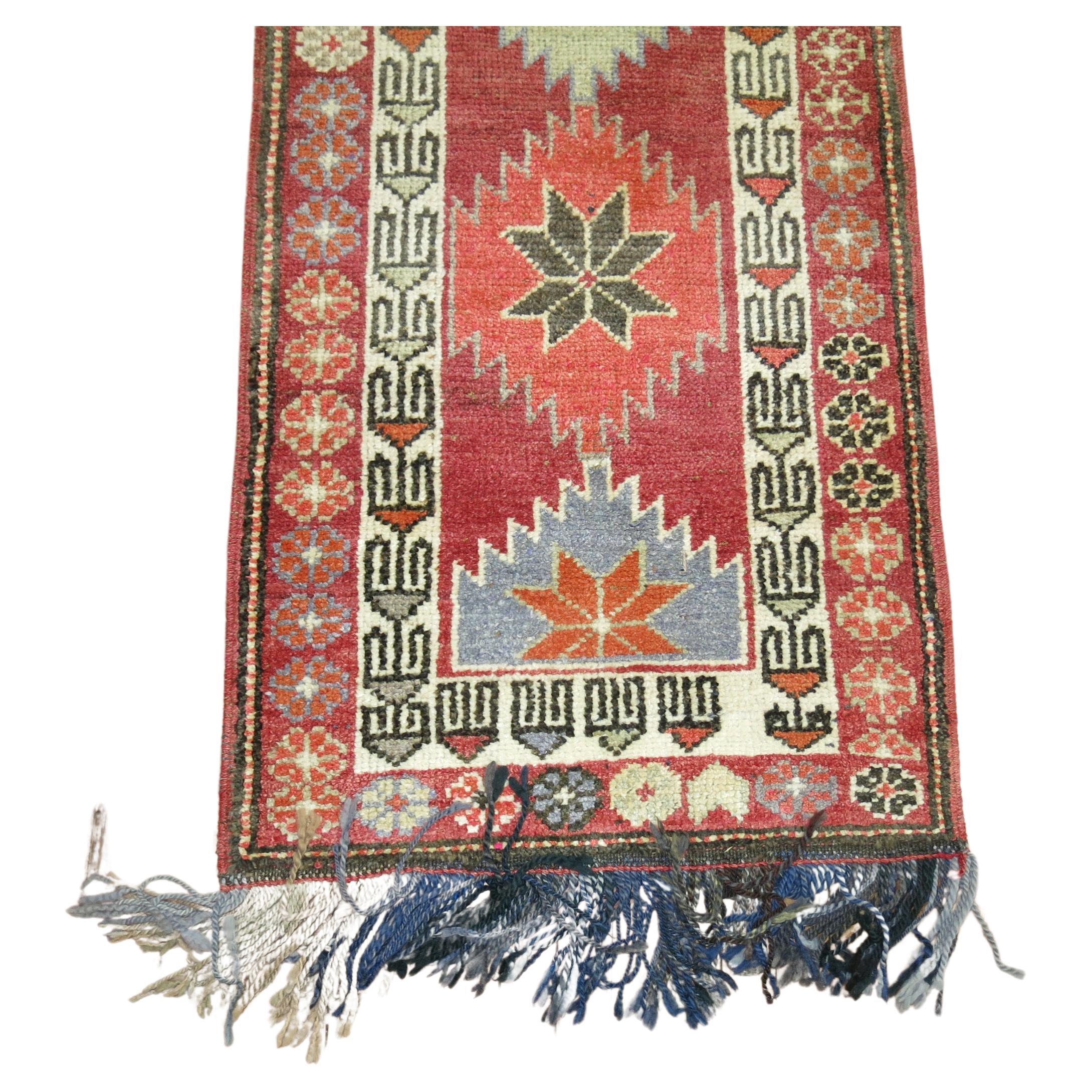 A Turkish anatolian runner from the middle of the 20th century. 

Measures: 2'7” x 13'9”.
