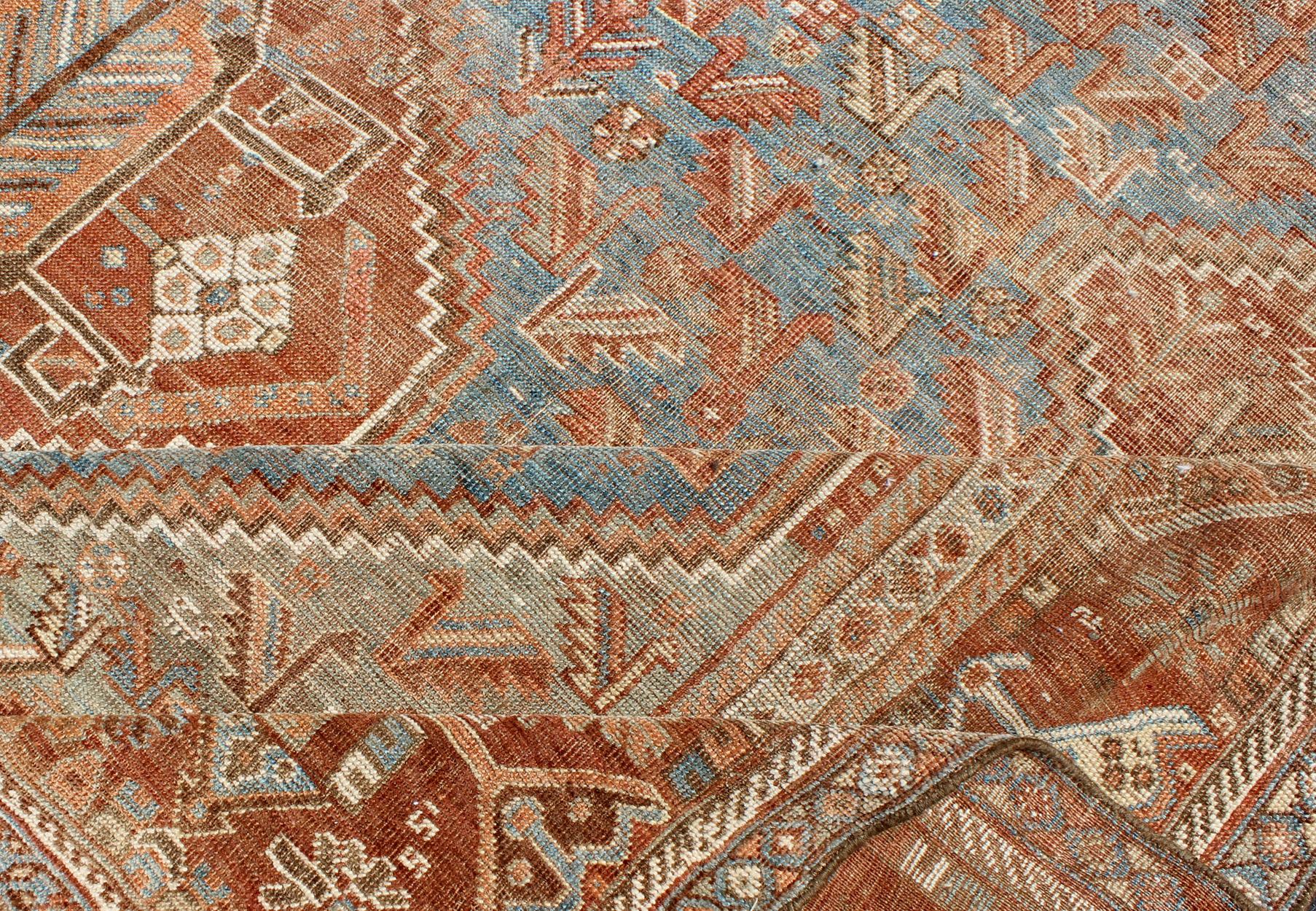 Geometric Vintage Persian Shiraz Rug with Tri-Medallion Design in Shades of Red In Excellent Condition For Sale In Atlanta, GA