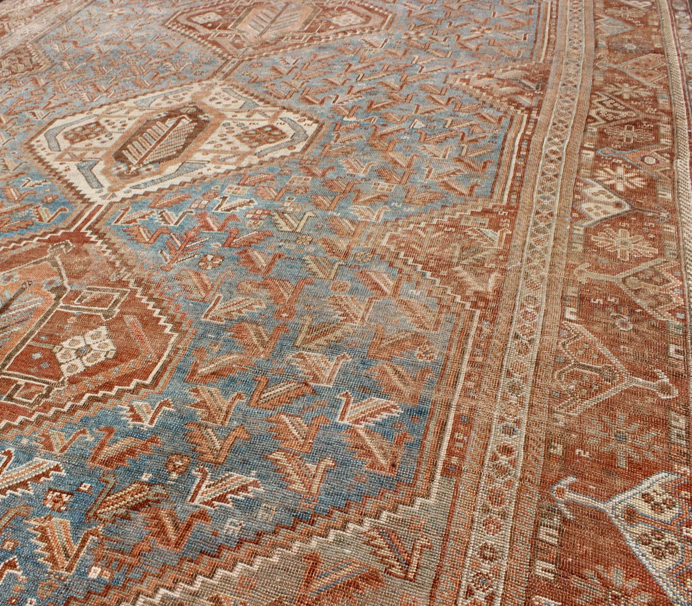 Geometric Vintage Persian Shiraz Rug with Tri-Medallion Design in Shades of Red For Sale 1