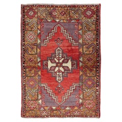 Geometric Vintage Turkish Oushak Carpet in Soft Red, Light Purple, & Gold Border