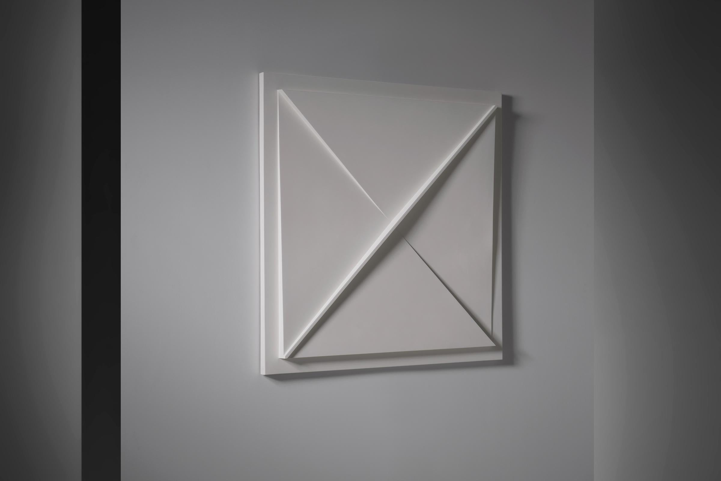 Geometric wall relief by Henk van der Plas (1936-2009), The Netherlands 1974. Van der Plas was educated at the Royal Academy of Arts in The Hague. His work is characterized by monochromy, repetition in rhythm and regularity and the use of modern