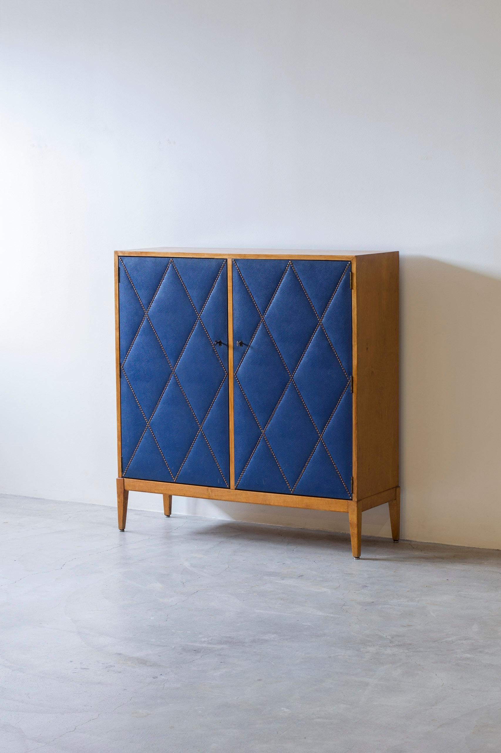 Striking cabinet attributed to Swedish designer Otto Schulz. Made with the by Otto Schulz patented 