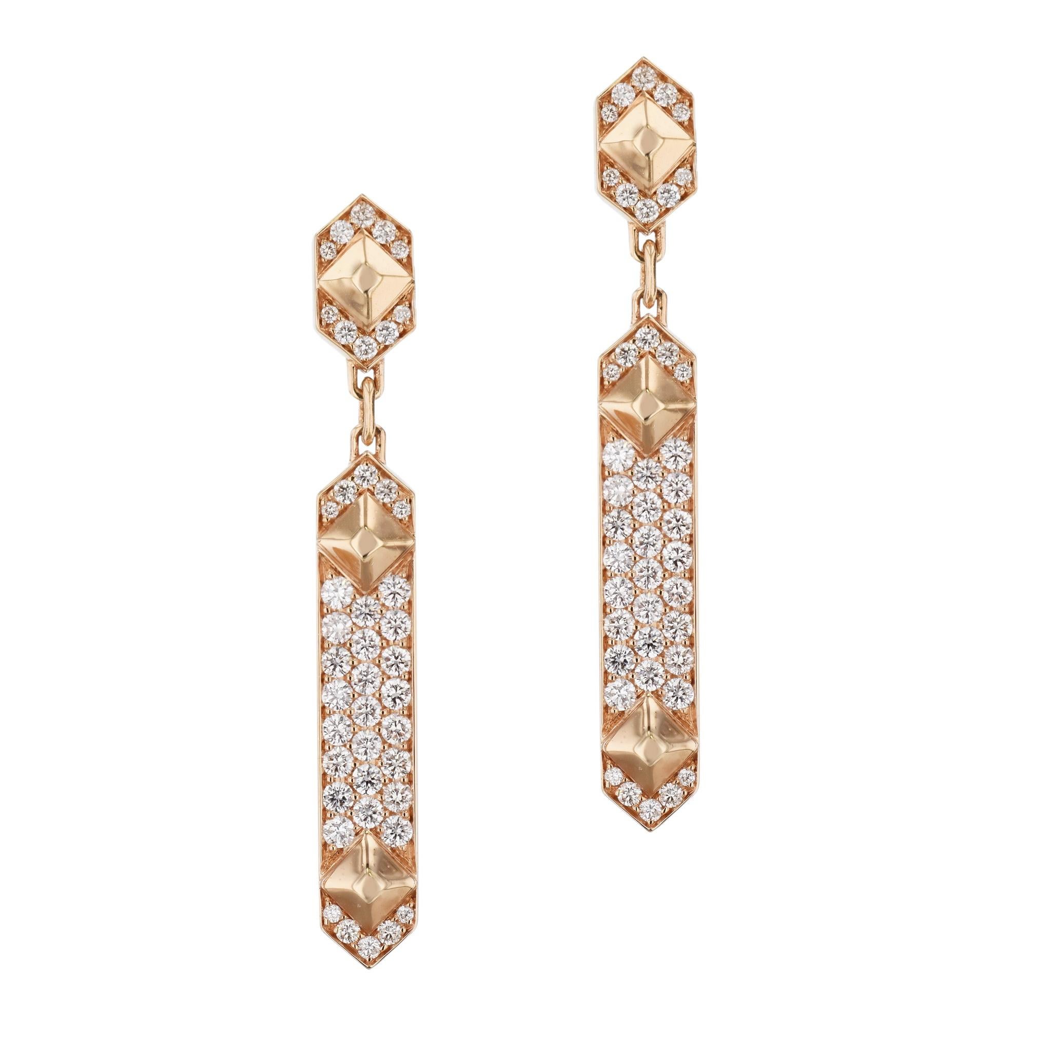Glimmer with sophistication in these dazzling diamond 18 karat rose gold, drop earrings!

These earrings measure 45 mm long and are 6 mm wide.

These earrings are very versatile. They are easy to wear to dress up an outfit, but could also