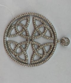 Ciondolo geometrico con diamanti in oro bianco