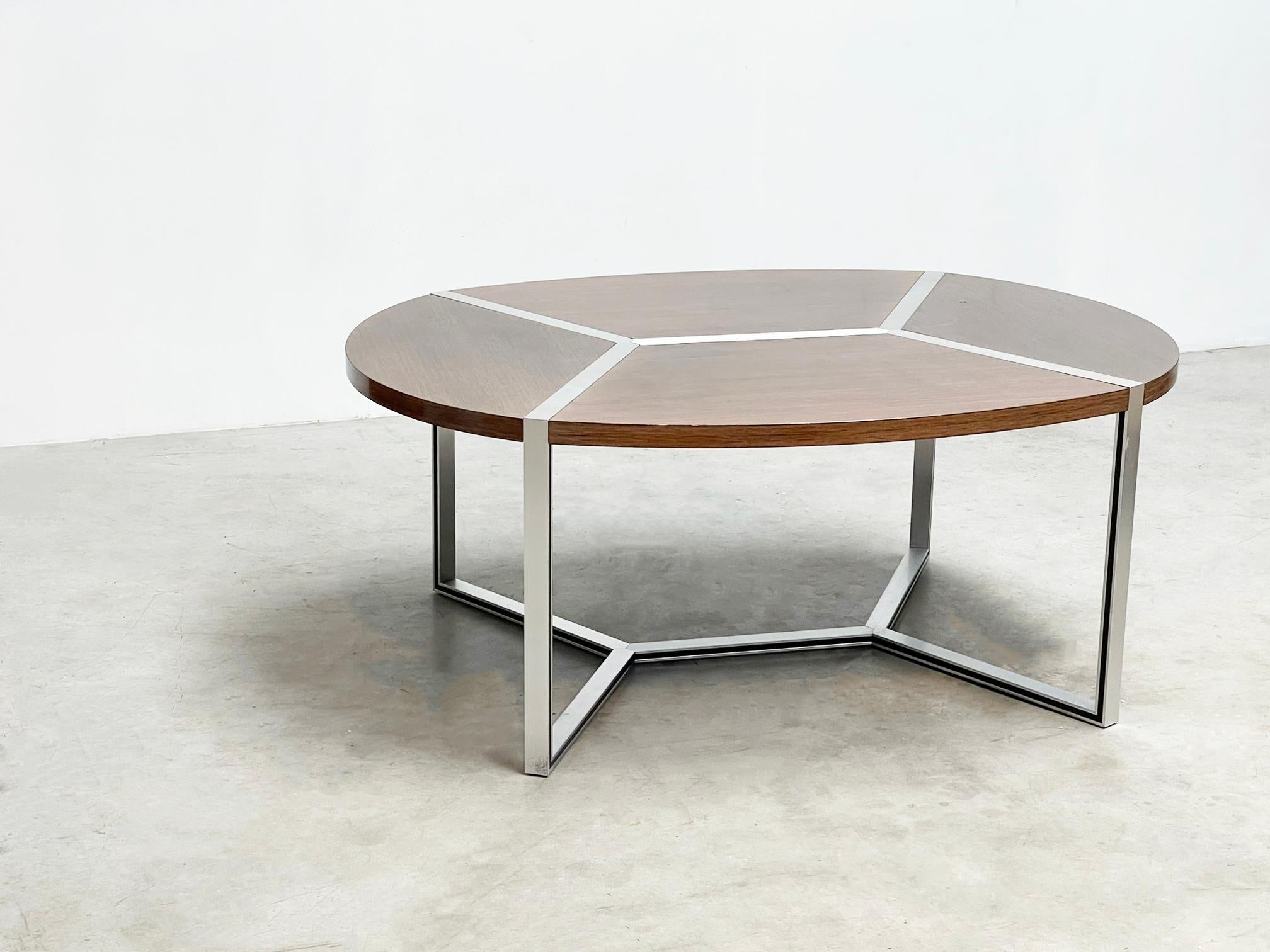 Geometrical Ligne Roset dining table
The geometric dining table from the 1980s, crafted by Ligne Roset and designed by Henri Lesetre and Claude Gaillard, embodies the era's fascination with sleek lines and bold forms. Its timeless appeal and
