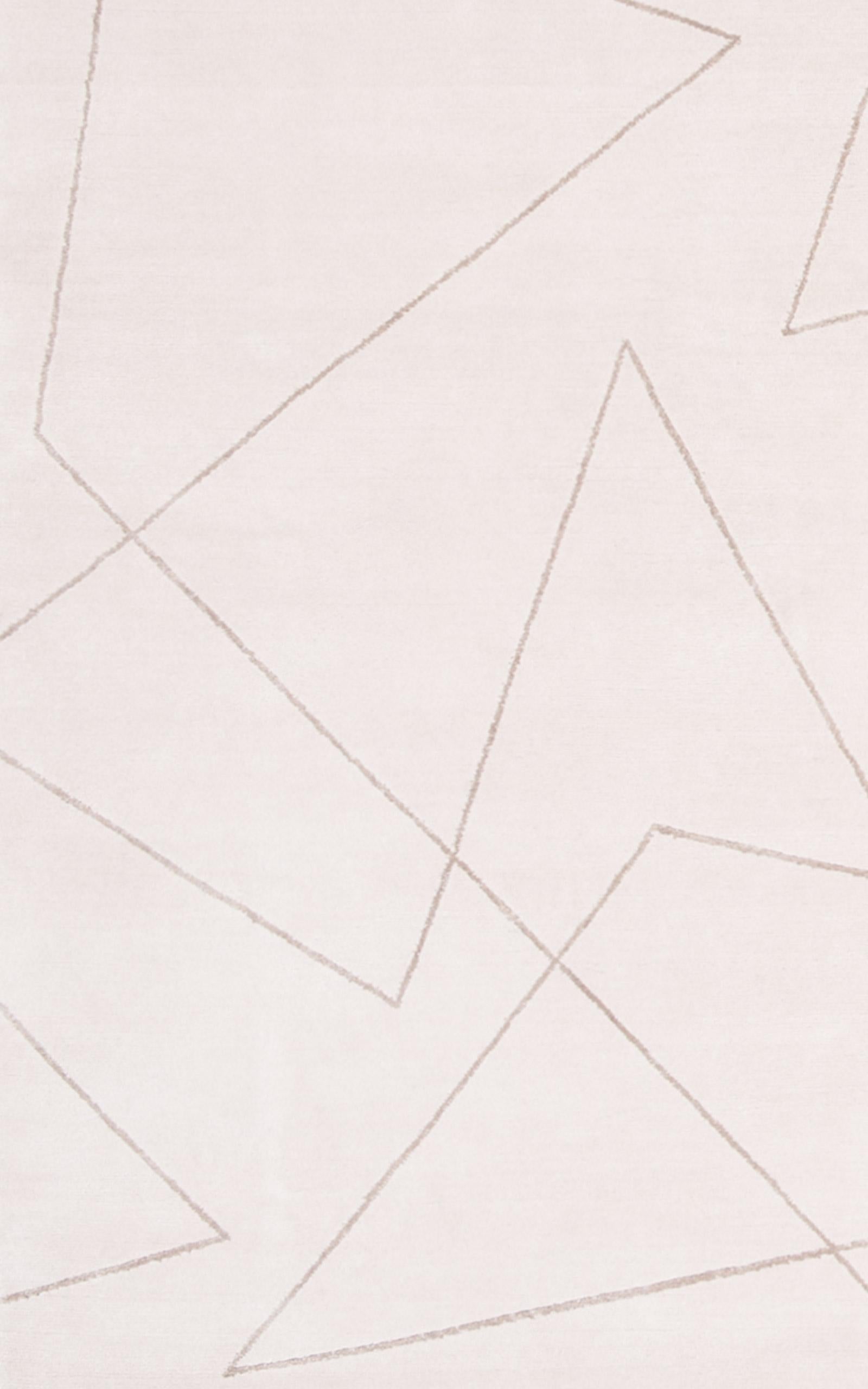 Angles est un tapis géométrique subtil qui reprend les contours de notre tapis Patchwork pour produire un effet minimaliste. Créé en fibres 100 % naturelles dans des tons clairs et neutres qui lui permettent de s'intégrer parfaitement à votre espace