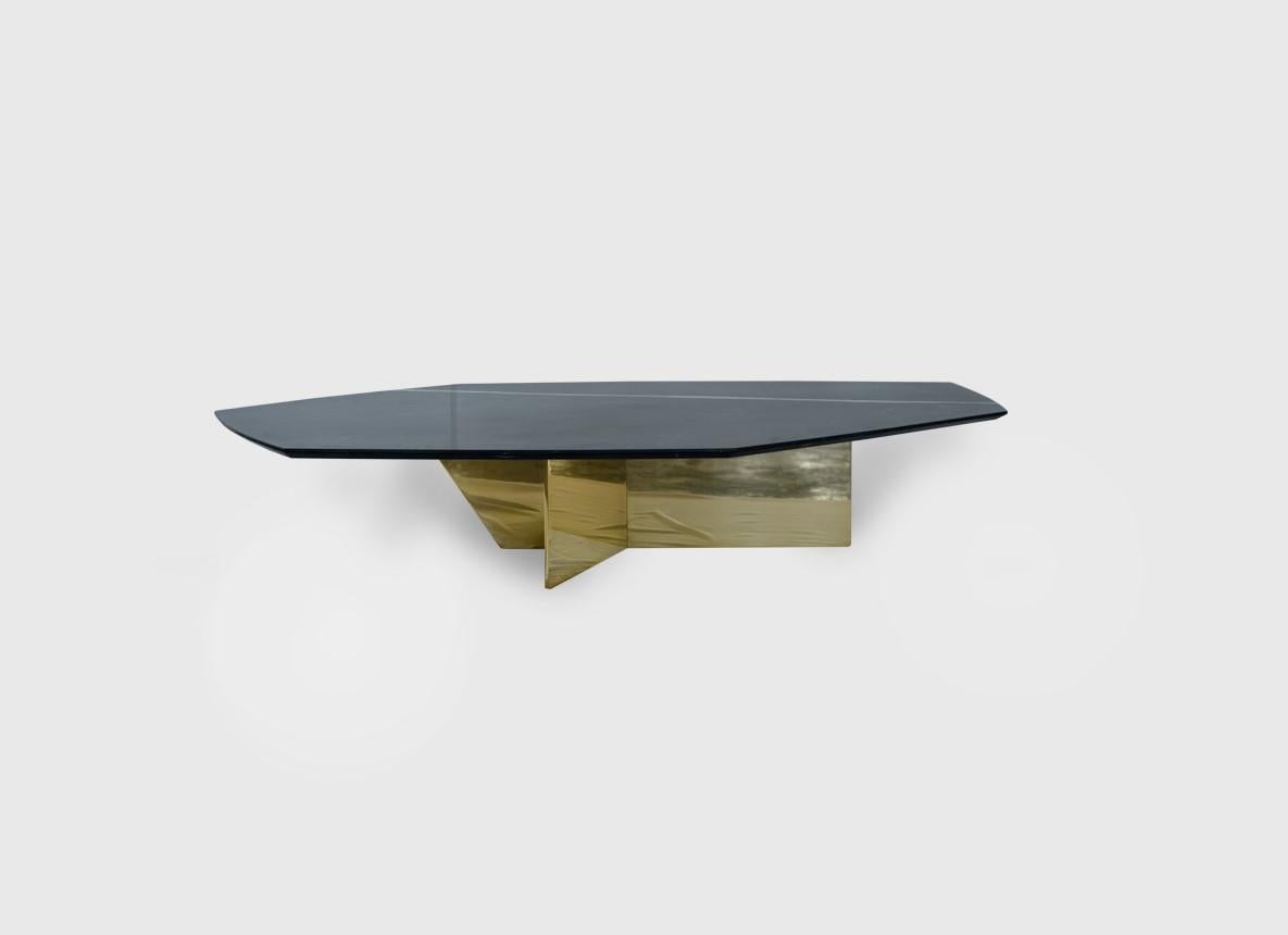 Geometrik marble and brass coffee table III by Atra Design.
Dimensions: D 130 x W 90 x H 32 cm.
Materials: Negro Monterrey marble, brass
Other marbles and sizes available. Polished brass, satin brass and aged brass sculptural solid base