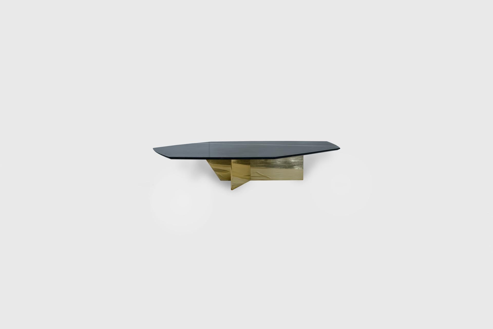 Geometrik Negro Monterrey Stone and Brass Small Coffee Table by Atra Design
Dimensions: D 90 x W 130 x H 32 cm.
Materials: Negro Monterrey stone and brass.

Available in three sizes. Different marble options available: Verde Tikal, Negro Monterrey,