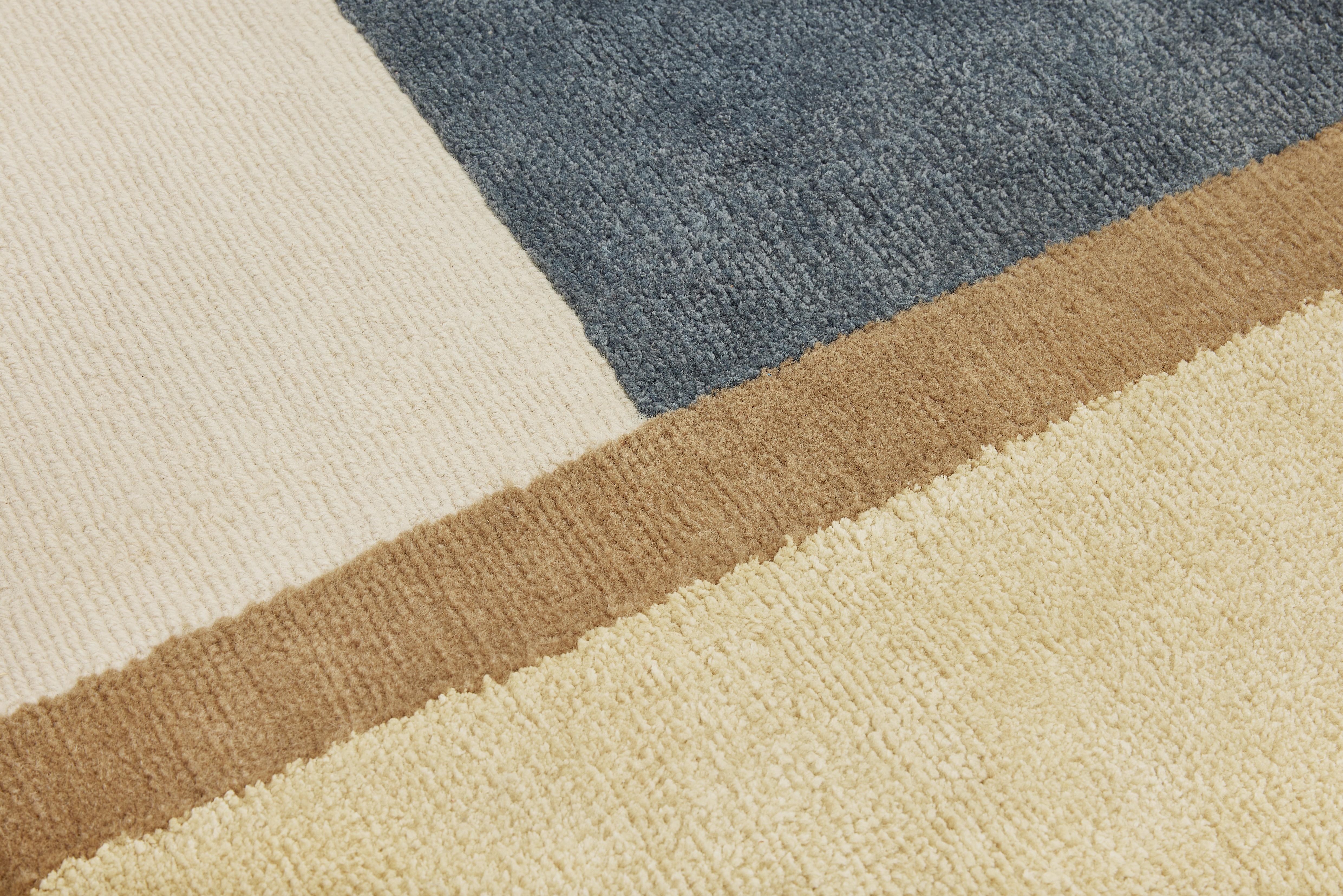 008 - Hand-woven Tibetan knot wool & silk rug 

In a world filled with complexity, there is beauty in simplicity. Welcome to our newest rug collection, where geometry meets minimalism and organic materials create an atmosphere of harmony and