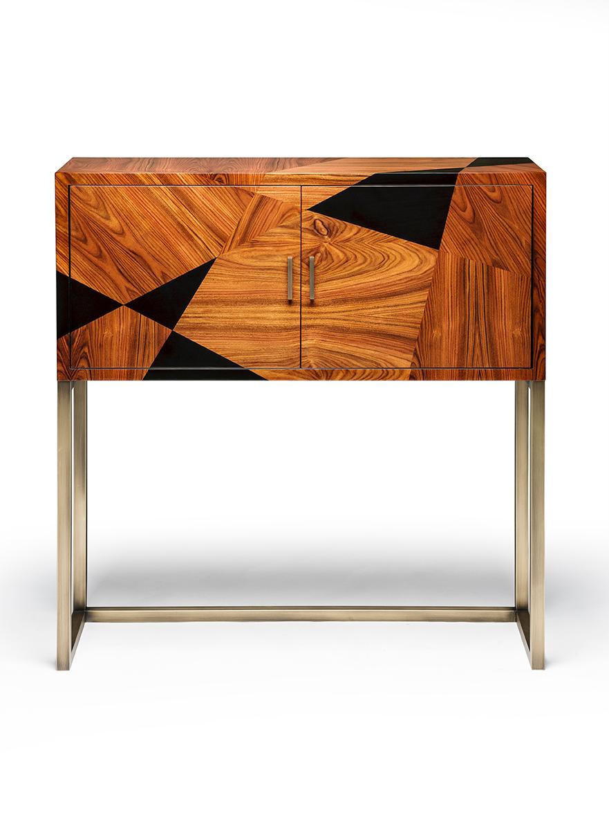 Geometry Cabinet by DUISTT 
Dimensions: W 110 x D 40 x H 120 cm
Materials: High Gloss Ebonized Sikomoro Wood and Ironwood , Brass details

The GEOMETRY cabinet uses the traditional marquetry technique in a contemporary design. This table has 2 dark