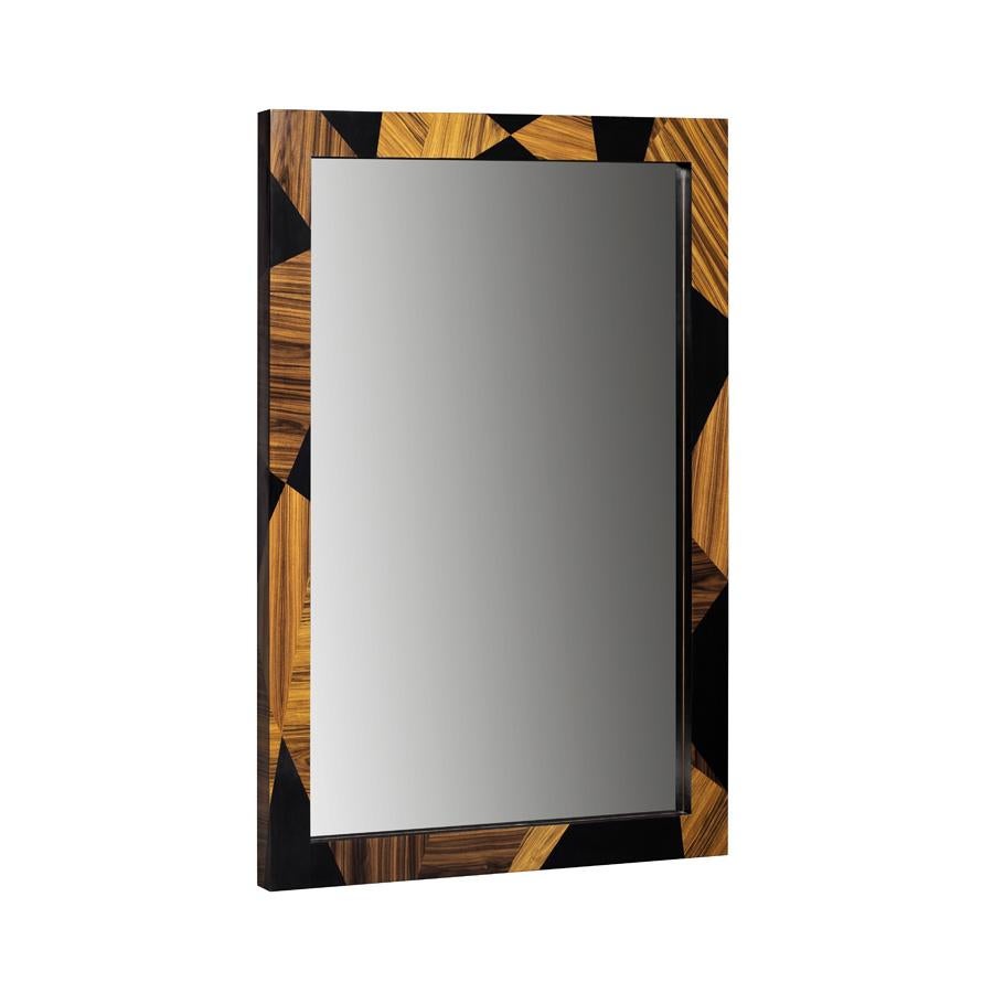 Miroir géométrique en bois de Sikomoro ébénisé, fabriqué à la main au Portugal par Duistt 

Le miroir Géométrie en bois de sikomoro ébonisé utilise la technique traditionnelle de la marqueterie dans un design contemporain. Le résultat de