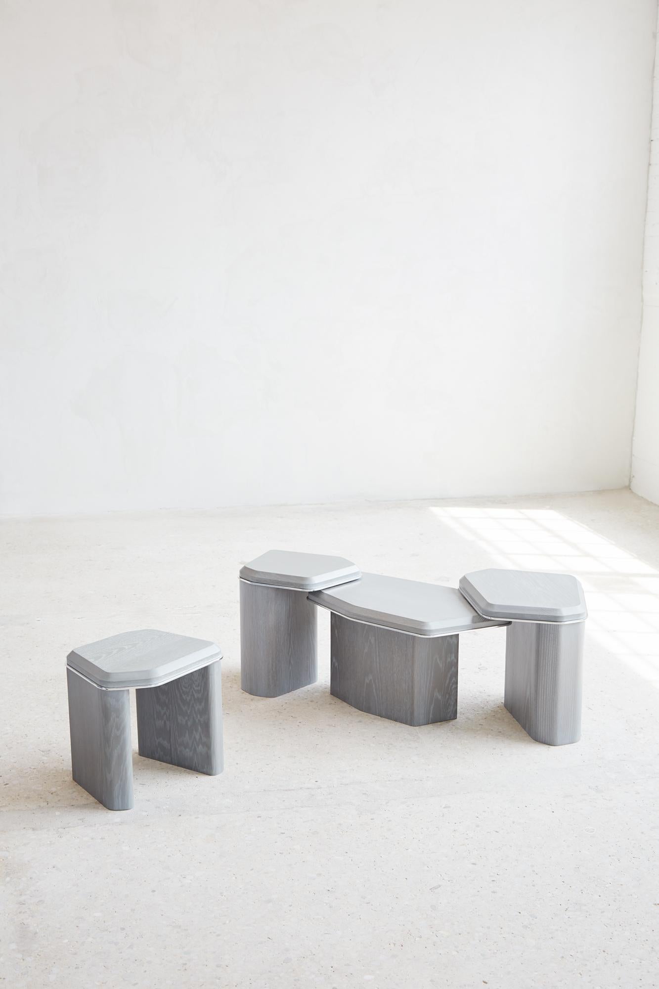 GEOMORPH NESTING TRIO
A sister product to the Console Table, the Geomorph Side Tables are inspired by the iconic metamorphic rock formations of the Canadian Shield and fabricated with oak and aluminum. Their shapes have a geometric but rounded