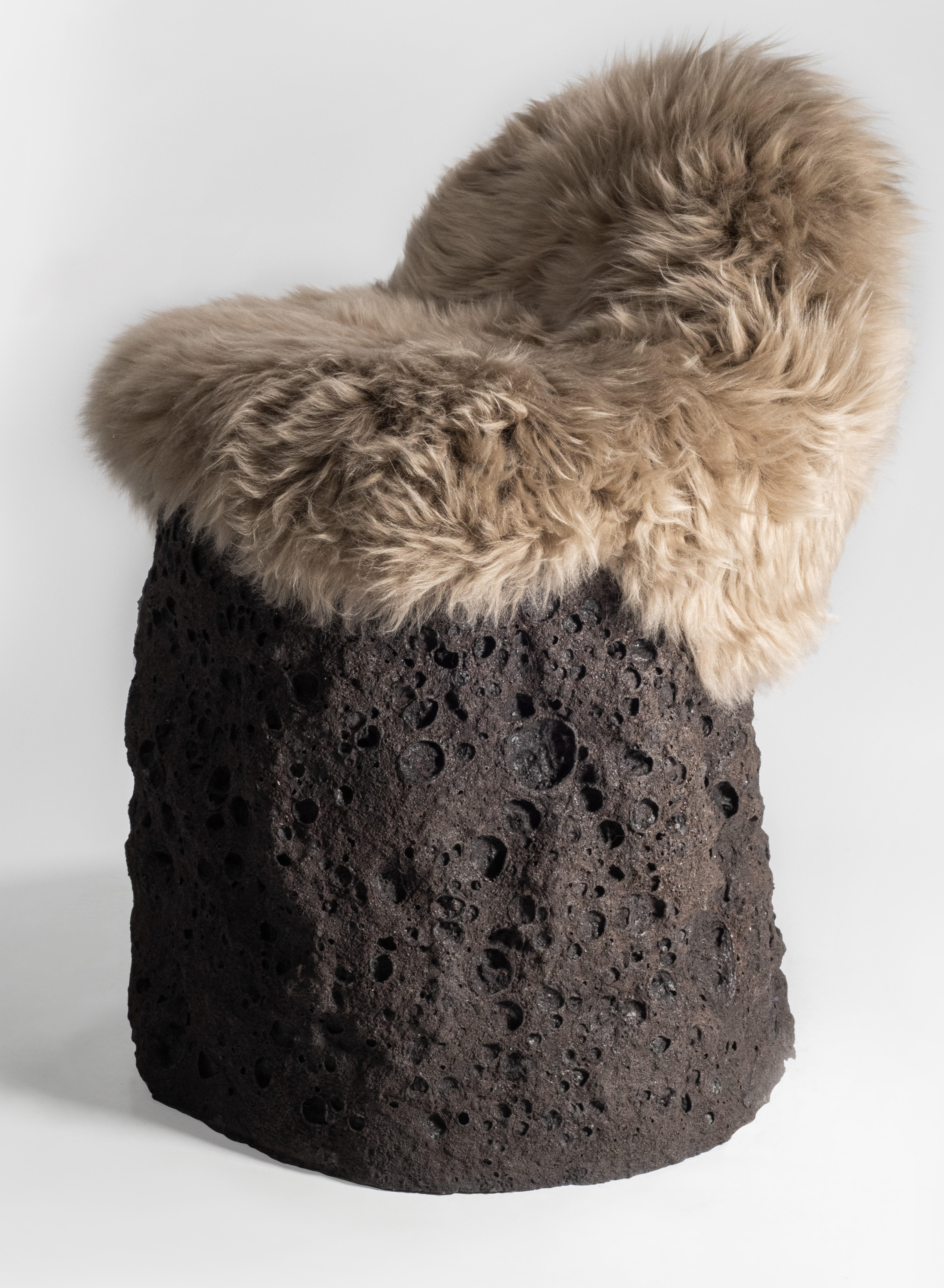 Geoprimitive ceramic settle with sheep wool by Niclas Wolf
Unique piece, numbered
Materials: ceramic 
Dimensions: Ø55 x H 65 cm
Weight: 49 kg

Certificates are issued for all pieces.

Geoprimitive_ is a design series that compares and