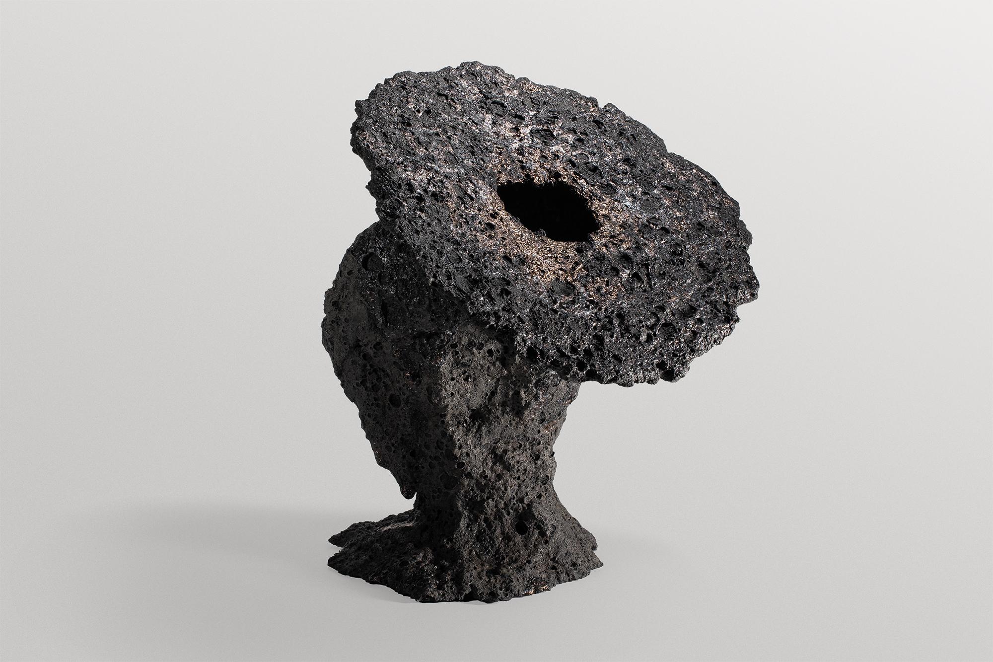 Geoprimitive 115 Sculptural Vase by Niclas Wolf
Unique Piece.
Dimensions: Ø 45 x H 57 cm.
Materials: Ceramic.

GEOPRIMITIVE_ is a design series that compares and connects the
Precambrian, the birth of our home planet and today‘s
