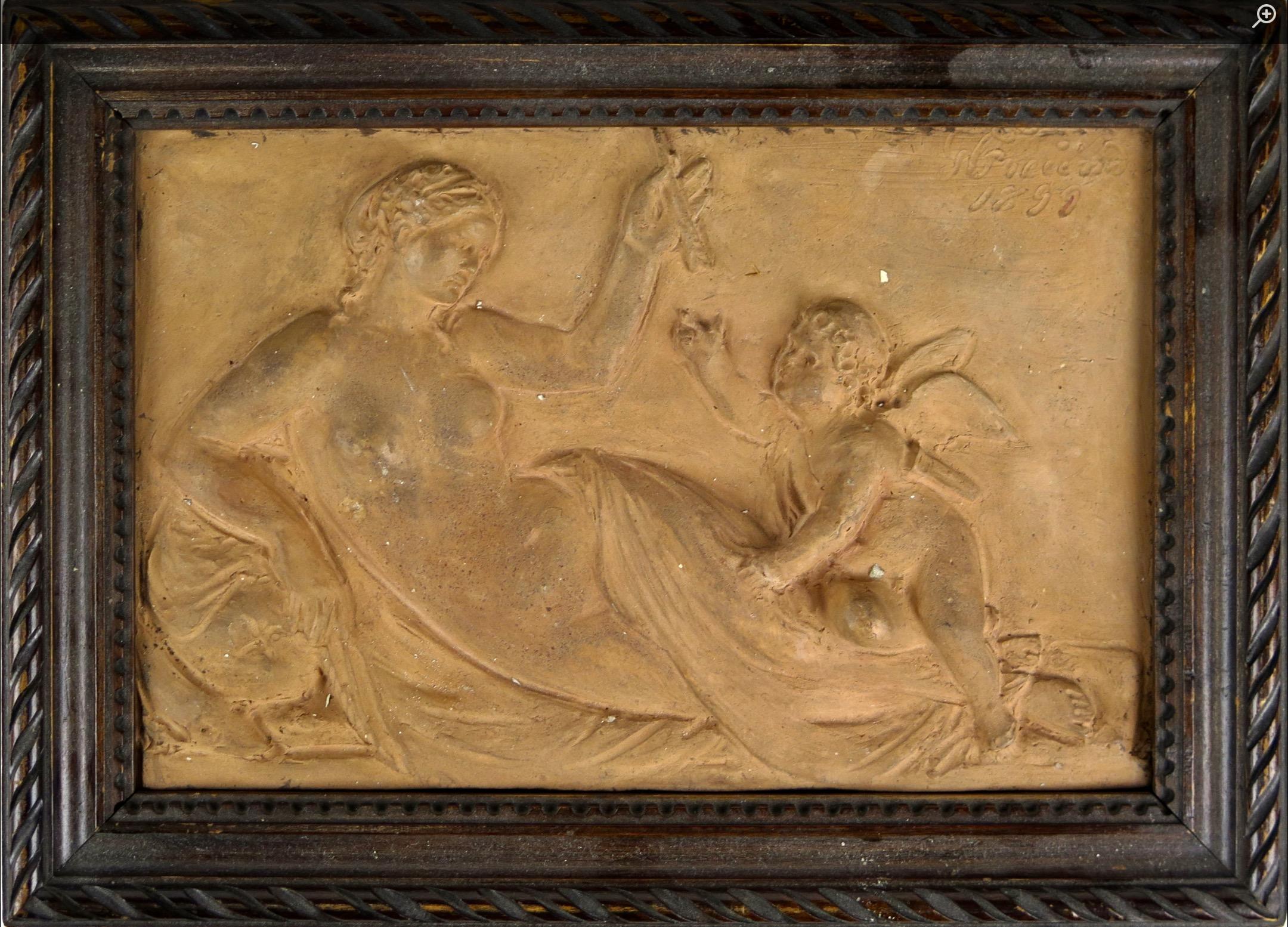 A fine terracotta relief of Venus and Cupid by Georg Christian Freund, (1821 - 1900), a Danish sculptor.  Signed and dated 1899. Mounted in the original hand carved frame, possibly made by Freund. 
A terracotta relief of Eumaios and Odysseus signed