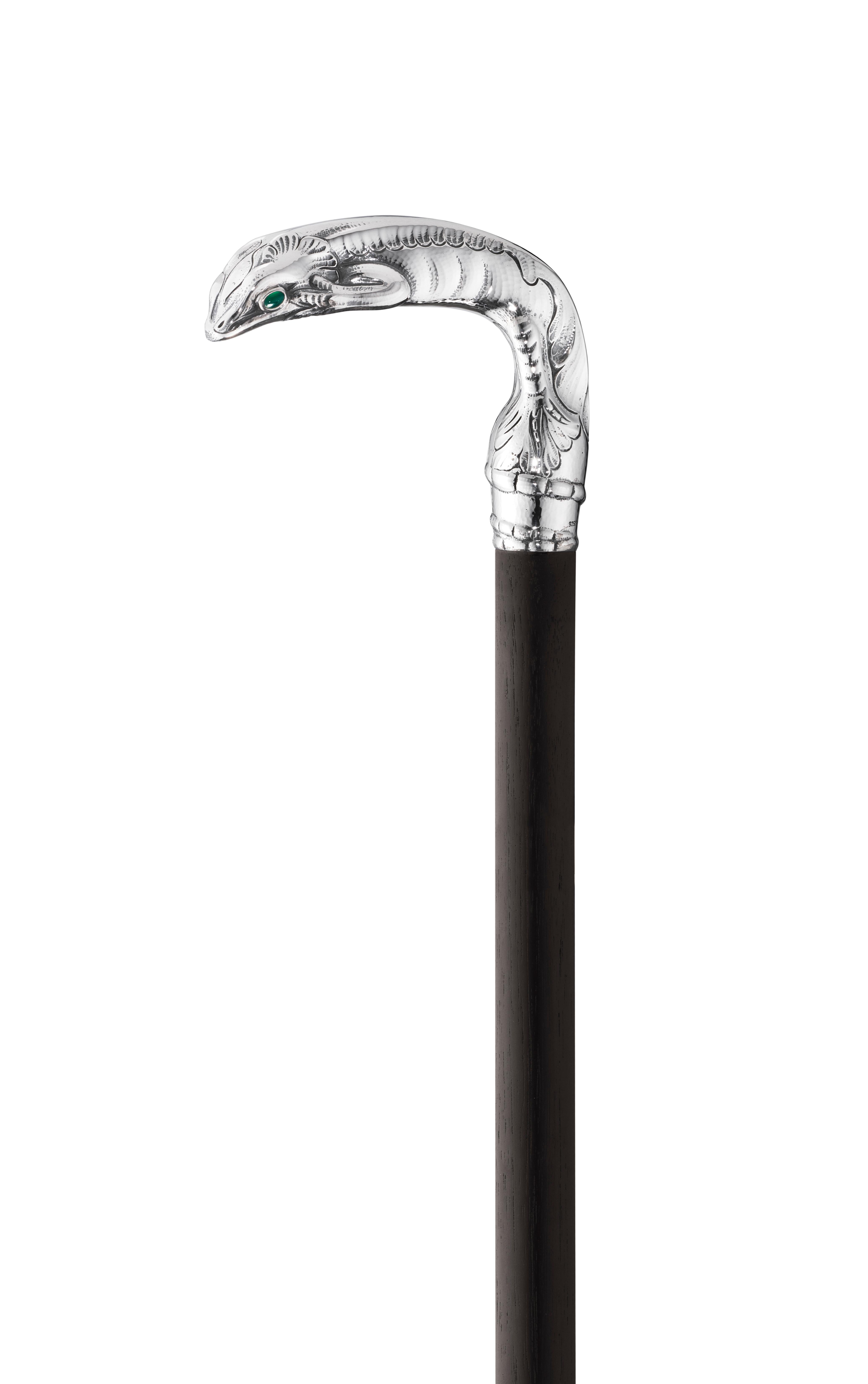 Art nouveau walking stick designed by Georg Jensen with handle shaped as a salamander with green agate eyes.
        