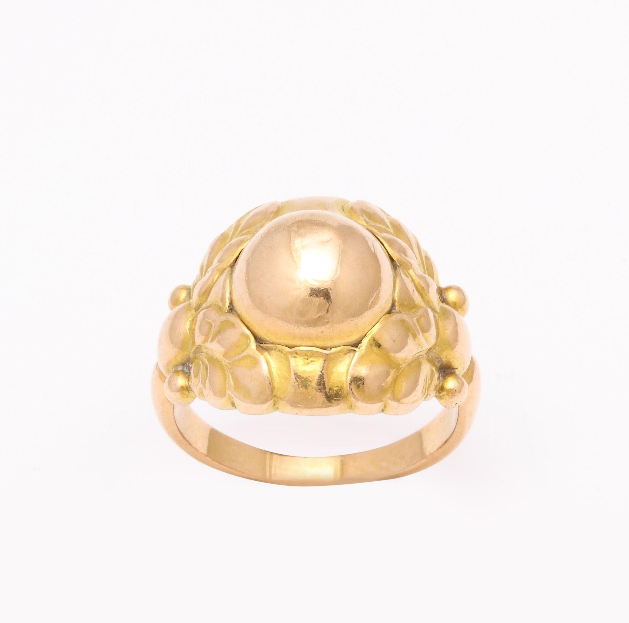 18K Gold GEORG JENSEN #111B Ladies Ring. Modernist Gold Ring with Leaf design. Marked: Georg Jensen in circle. 765; 18K. Size 5.5 Dimensions: Weight: 3.05 DWT
Model no. 111B in 18k gold. With 2 tones of gold - a rose gold band and cabochon and