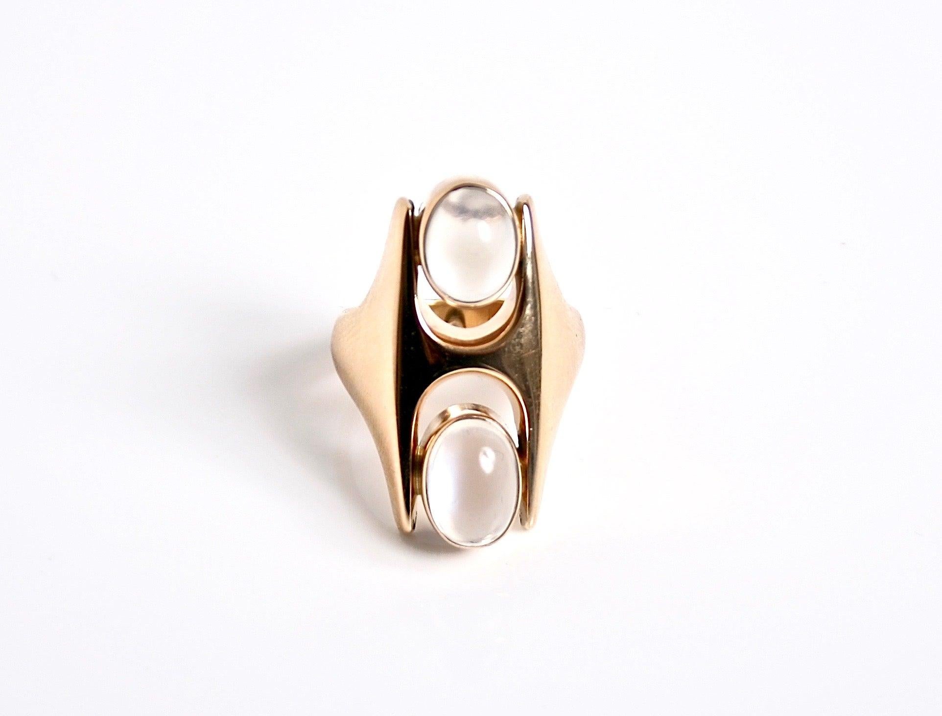 Rare Georg Jensen 18 Karat Gold & two cabochon Moonstone Ring designed by Henning Koppel Denmark c1967 Stunning example of Midcentury Modern Design
Design number 845
Size UK S