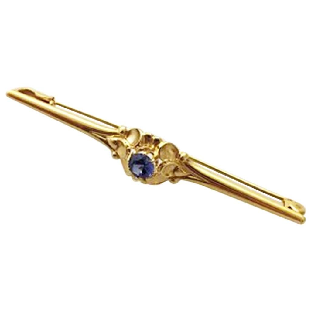 Georg Jensen 18 Karat Gold Brooch with Synthetic Sapphire #281 For Sale