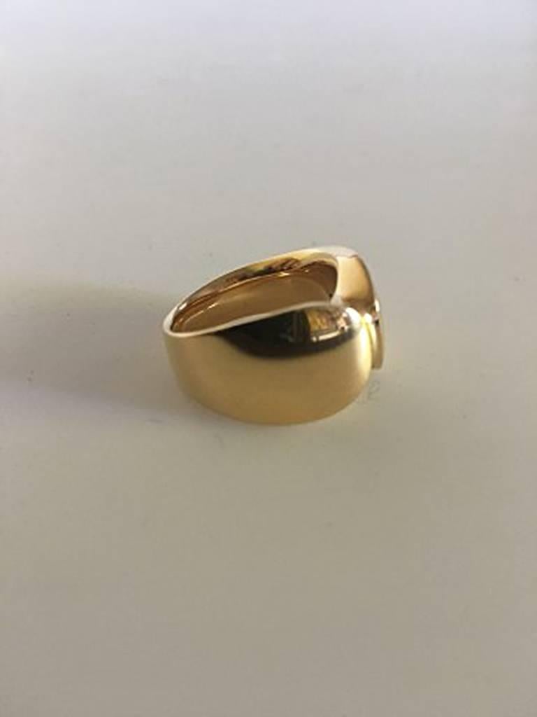 100 karat gold ring