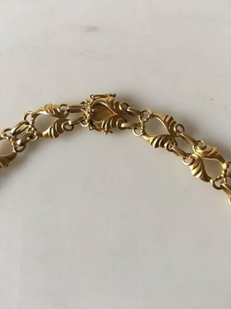 Georg Jensen 18K Gold Necklace No 249. From 1932-1945. Measures 36 cm / 14 11/64 in. Weighs 24 g / 0.85 oz.