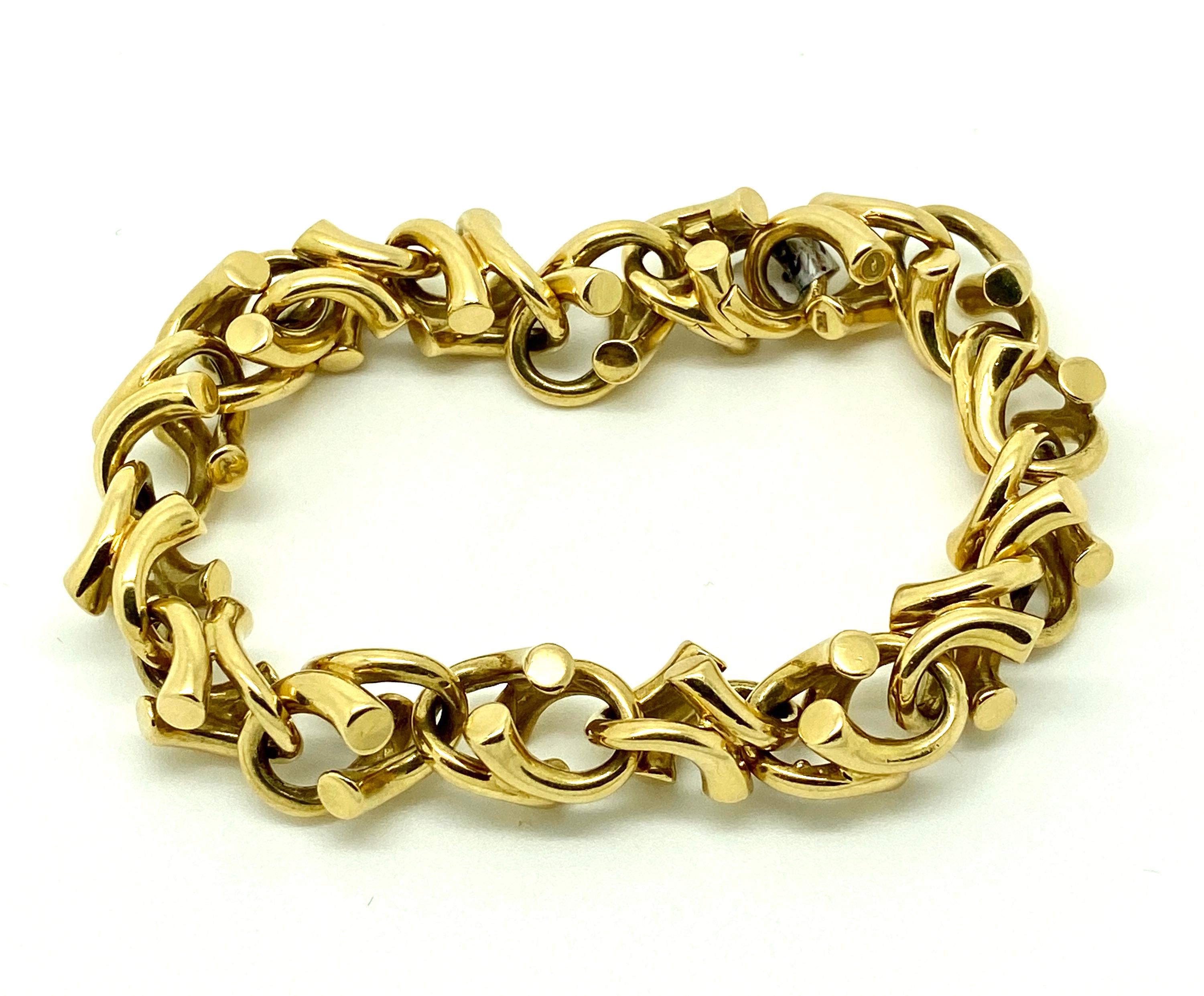 Georg Jensen 18 Karat massives Gelbgold  Vintage-Armband Dänemark um 1990
Magisches Armband entworfen von Regitz Overgaard
Frühes Design Nummer 1490
Präsentiert in einer original Georg Jensen Box
