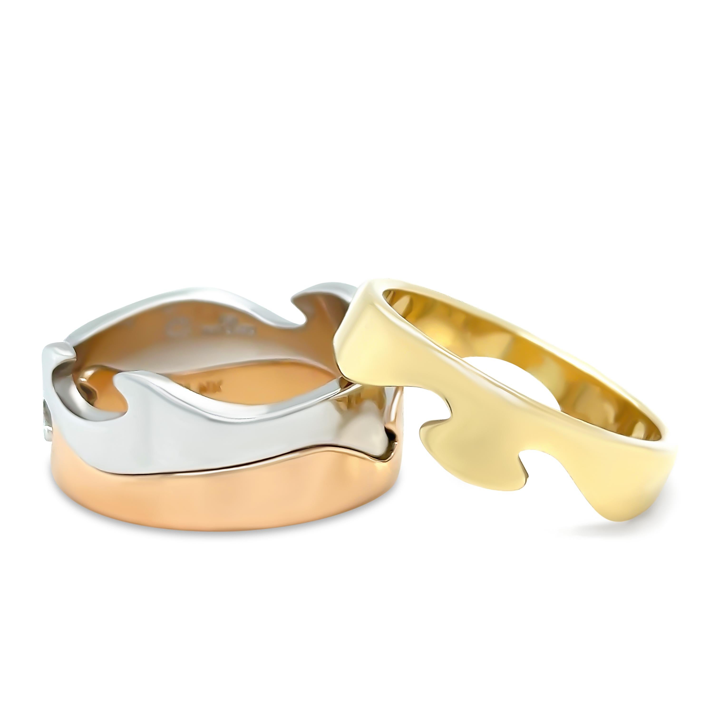A Georg Jensen Fusion Three Piece Ring, made of 18ct Yellow, White and Rose Gold. 

Metal: 18ct Yellow, White & Rose Gold
Carat: N/A
Colour: N/A
Clarity: N/A
Cut: N/A
Weight: 21.9 grams
Engravings/Markings: Signed Georg Jensen 750 Denmark 61