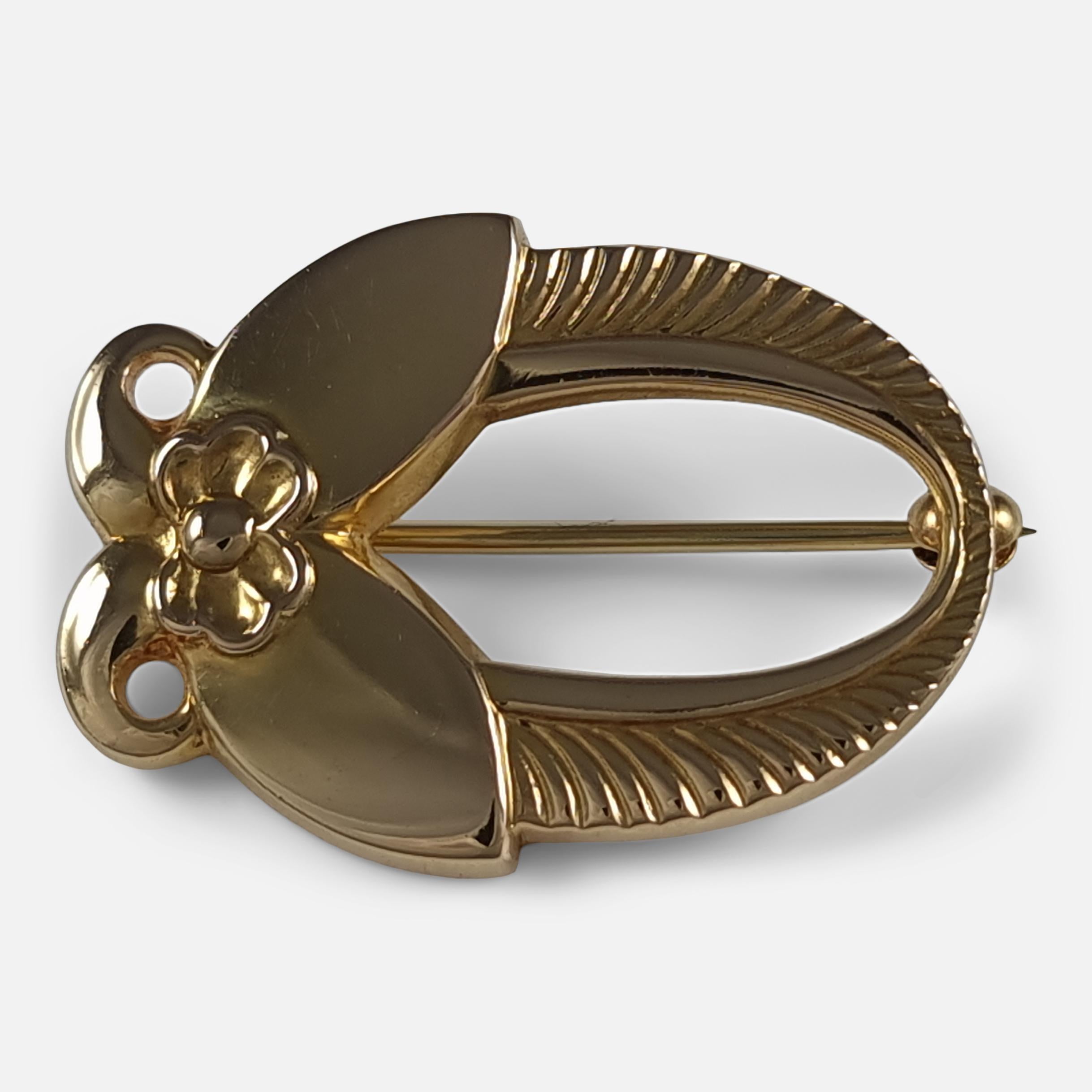 Georg Jensen 18ct yellow gold stylised floral brooch #1227, designed by Gundorph Albertus for Georg Jensen.

The brooch is stamped with the Georg Jensen mark used since 1945, '750', '18K', & '1227'. Also hallmarked with Edinburgh assay marks, and