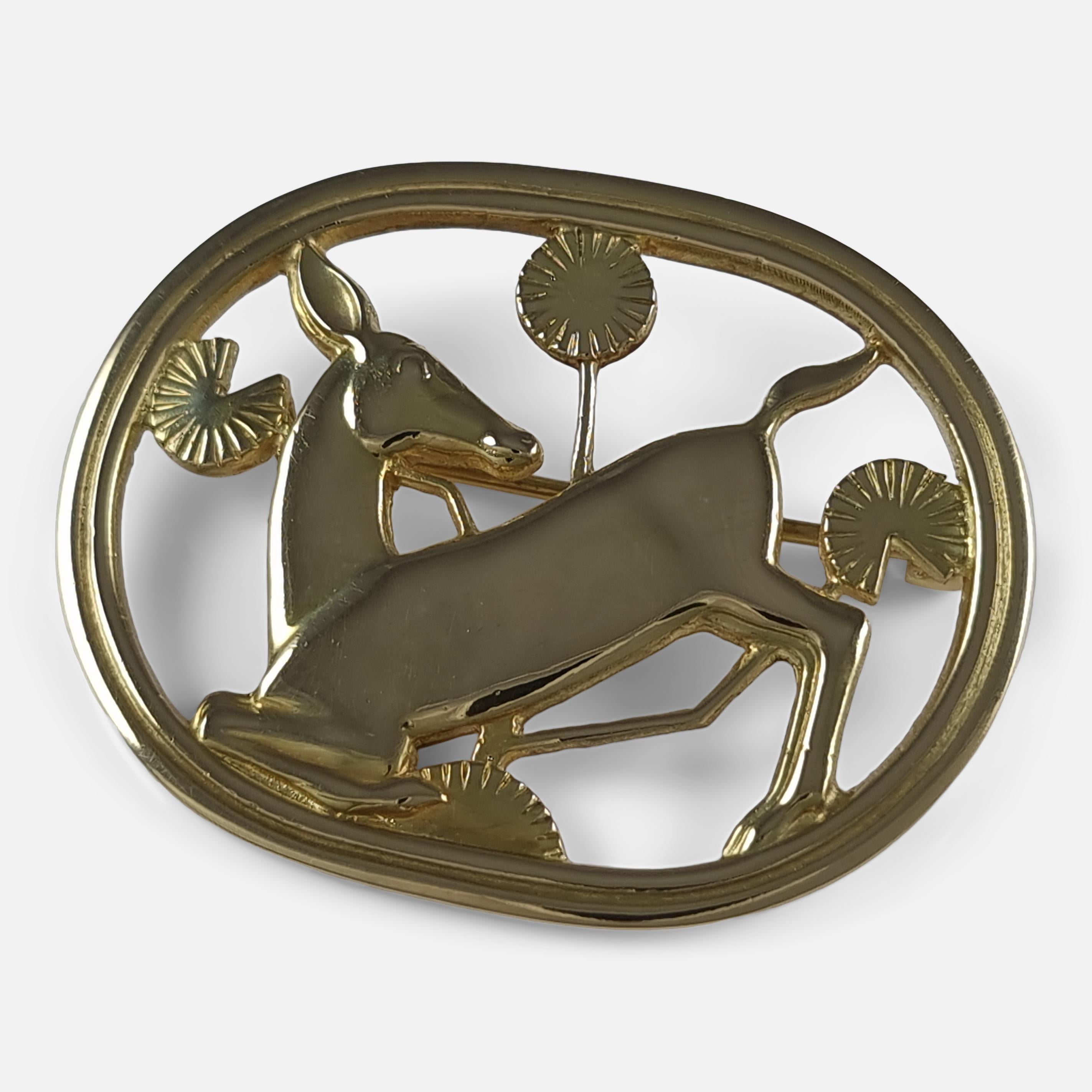 18ct yellow gold kneeling fawn brooch #343 by Arno Malinowski for Georg Jensen, featuring the Georg Jensen mark post-1945, '18K', '765', and '343', plus Edinburgh assay and '750' for 18 carat gold.

• Period: Mid-20th century
• Measurement: 4.4cm
