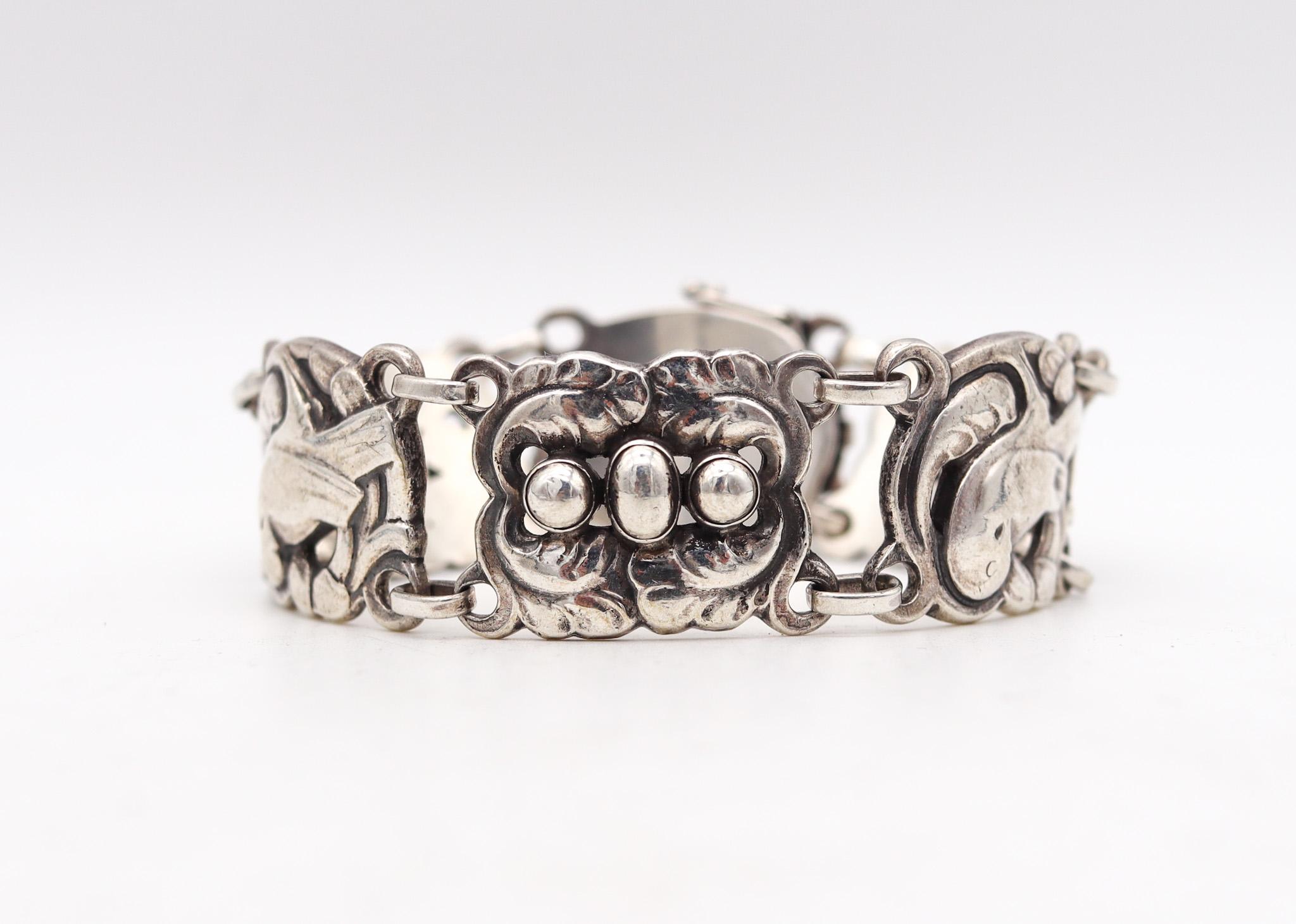 Art nouveau bracelet designed by Kristian Mohl-Hansen for Georg Jensen.

This is one of the most early and iconic bracelet, created in Copenhagen Denmark by the silversmith designer Kristian Mohl-Hansen for the Georg Jensen company, back in the