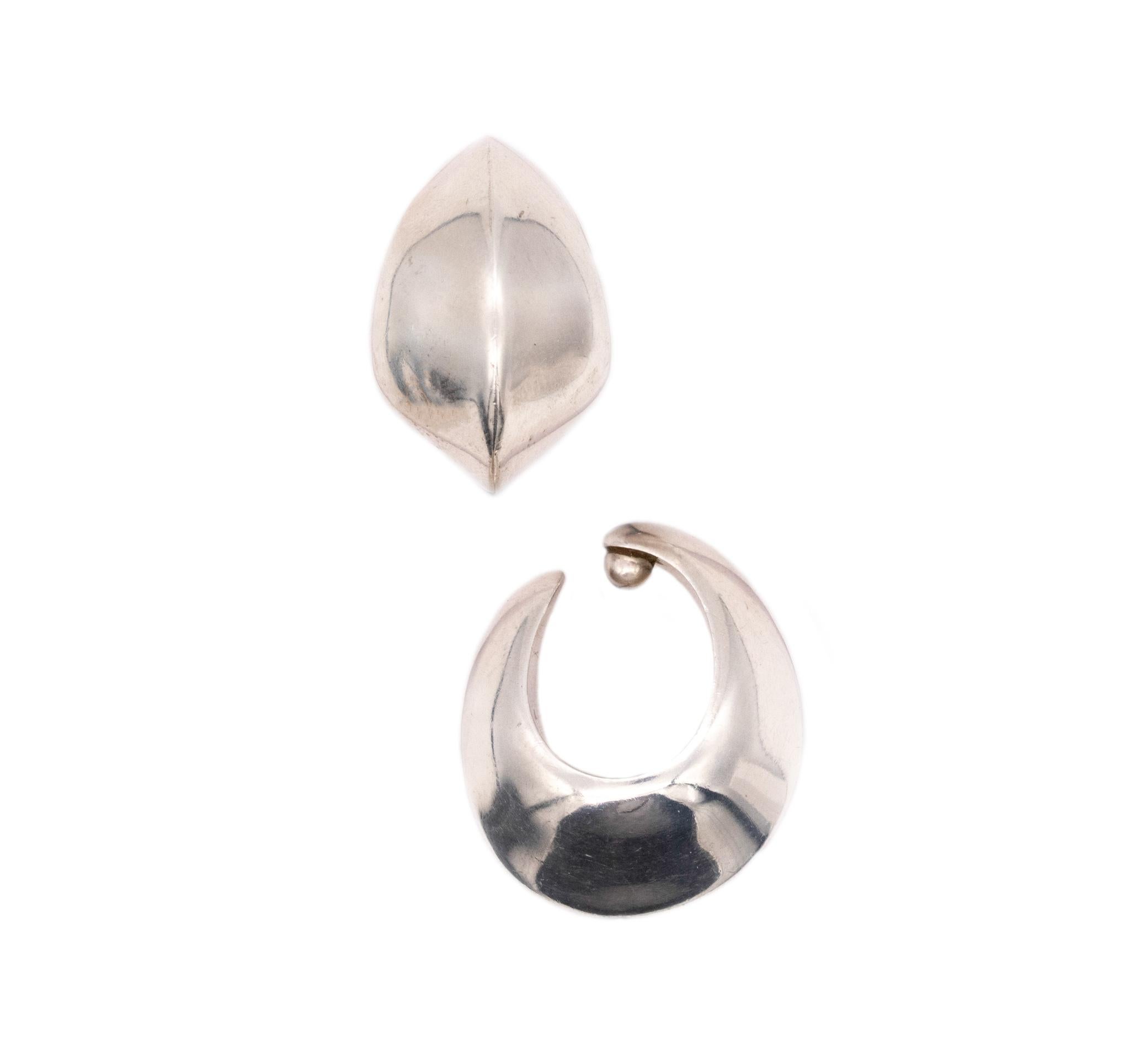 Hoops-earrings designed by Nanna Ditzel for Georg Jensen. 

These are a very rare sculptural pair of hoops earrings, created in Denmark at the Georg Jensen Studios by Nanna Ditzel, back in the 1958. This pair of hoops are the model number 126 and