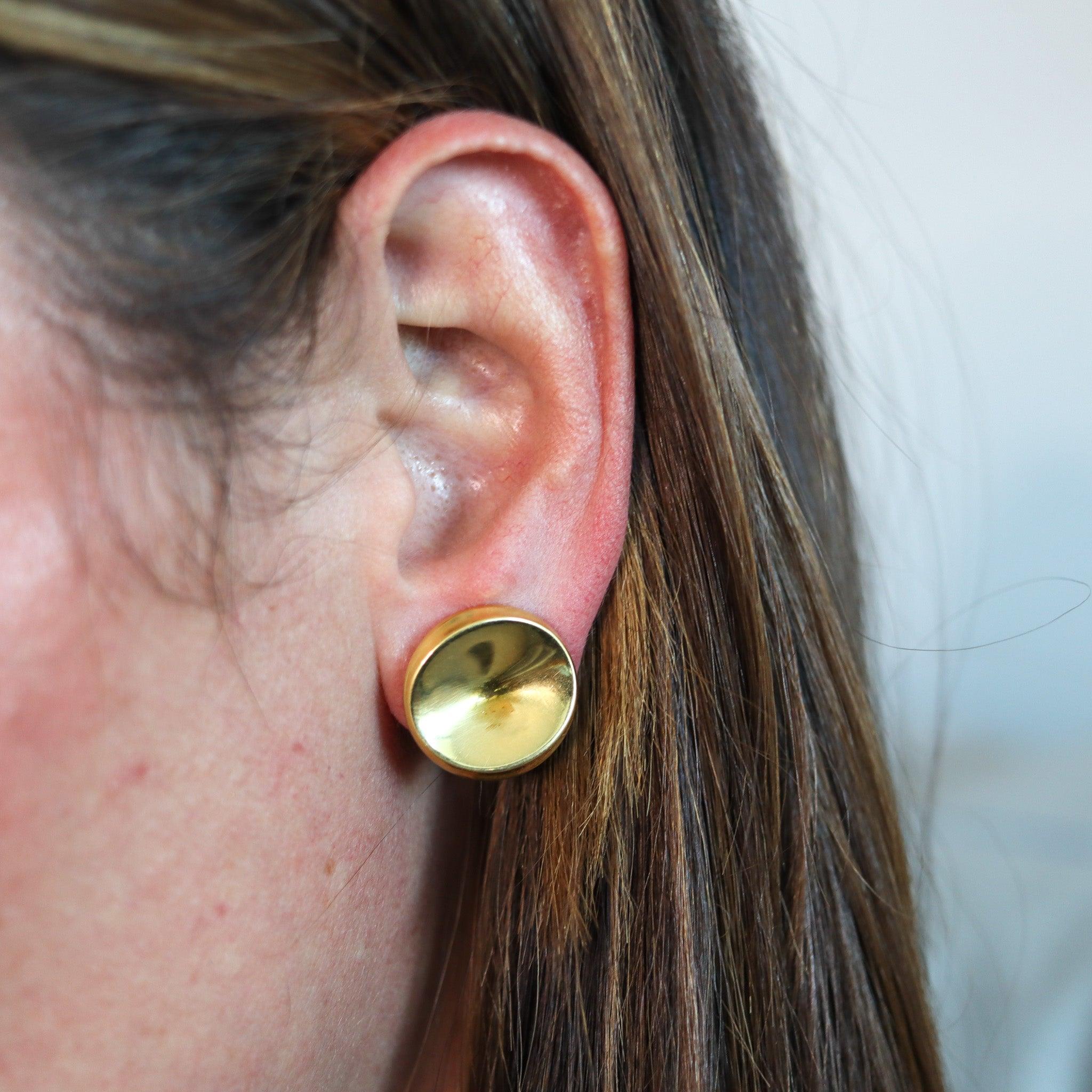 Clips-on earrings designed by Nanna Ditzel for Georg Jensen. 

Very rare sculptural pair of clips earrings, created in Denmark at the Georg Jensen Studios by Nanna Ditzel, back in the 1960. These pair of earrings are the reference model number 1136C