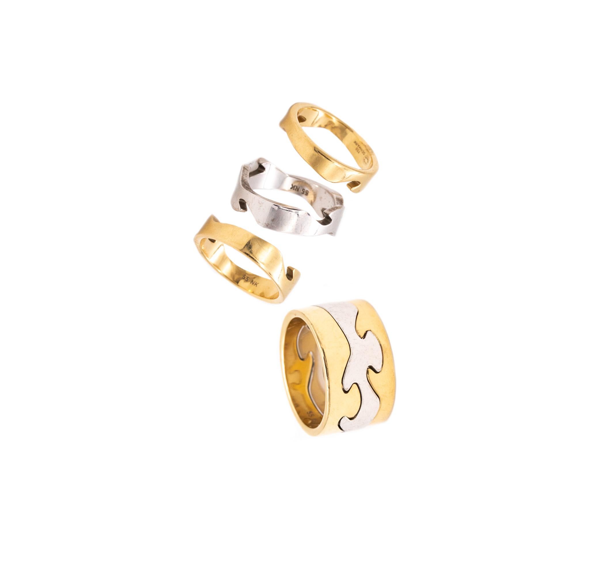 Three-rings set designed by Nina Koppel (1940-1990) for Georg Jensen.

Nice trio designed by Koppel back in the 1970's for the Georg Jensen. Each fusion ring was individually crafted in solid 18 karats of yellow and white gold, with high polished