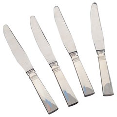Georg Jensen. 4 dinner knives in sterling silver and stainless steel.
