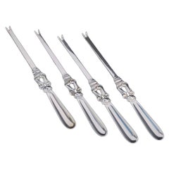 Georg Jensen. 4 lobster forks, “Acorn / Konge”. Sterling silver, 1944-1951.