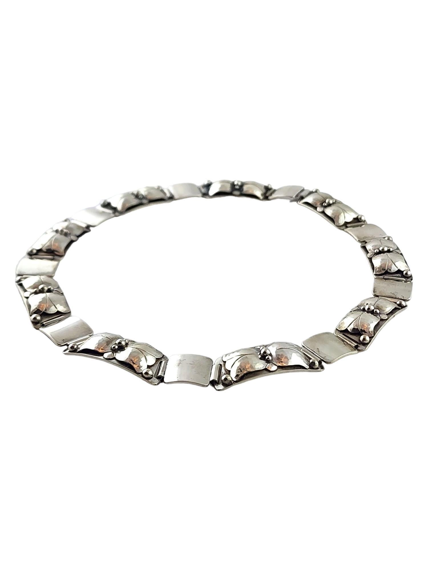 Georg Jensen USA Sterling Silver Tulip Panel Link Necklace #465

This beautiful necklace by designer Georg Jensen was meticulously crafted from sterling silver with beautiful detailing!

Length: 15