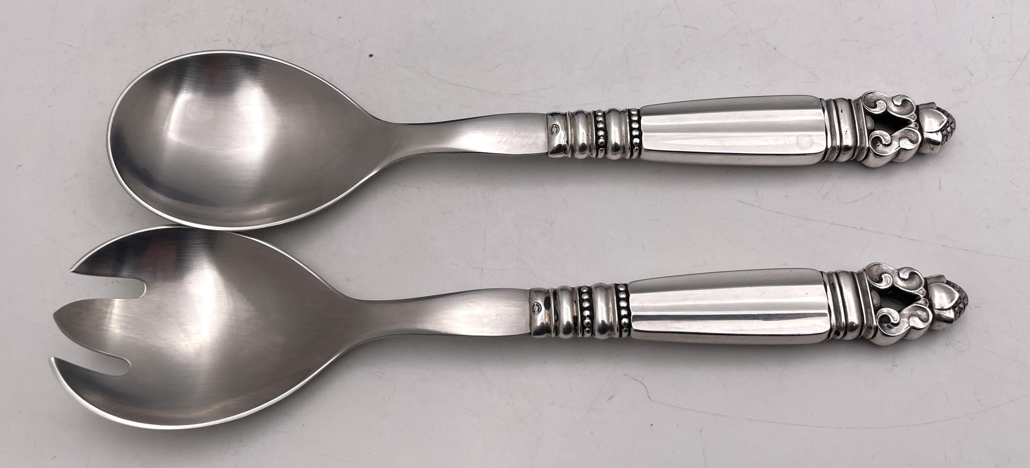 Georg Jensen sterling silver 76-piece flatware set in the celebrated Acorn pattern, designed by Johan Rohde, enhanced with stylized natural motifs, from the 1930s or early 1940s, consisting of:

- 12 Texan-sized dinner knives measuring 10'' in