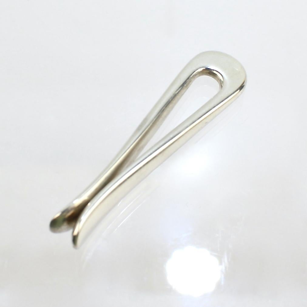 A fine Georg Jensen sterling silver tie bar or money clip.

Model No. 83.

Designed by Arno Malinowski.

Simply great Danish Modern design!

Date:
20th Century

Overall Condition:
It is in overall good, as-pictured, used estate condition with some