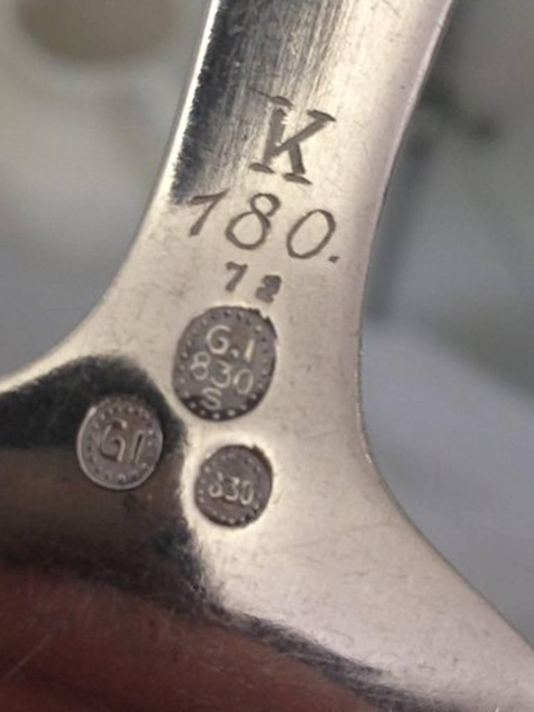 Georg Jensen 830 silver ornamental serving fork #72. Measures: 18 cm / 7 3/32 in.
